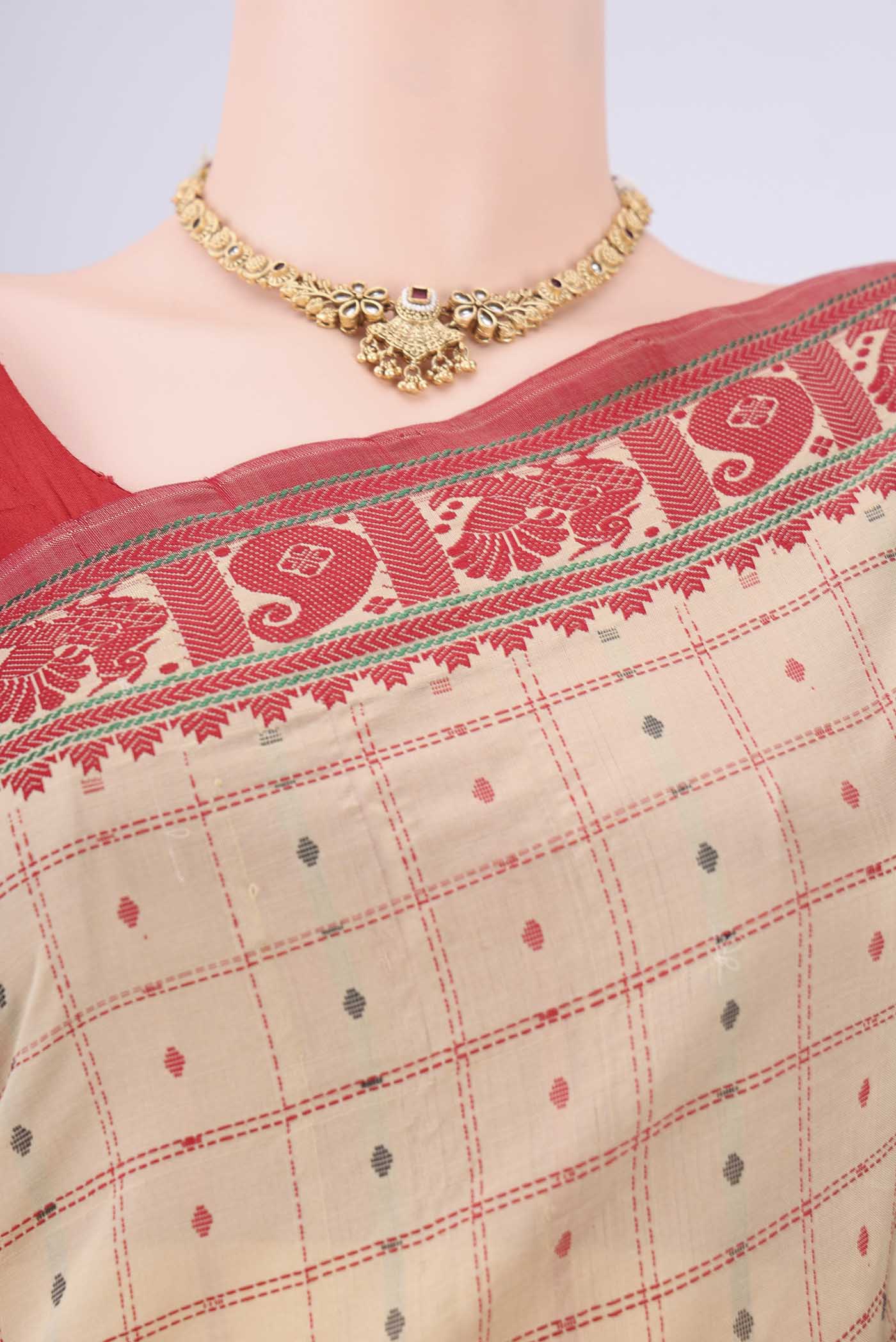 Border image of Beige Blended Poly Cotton Saree with Checked design on the body and Thread Border. 