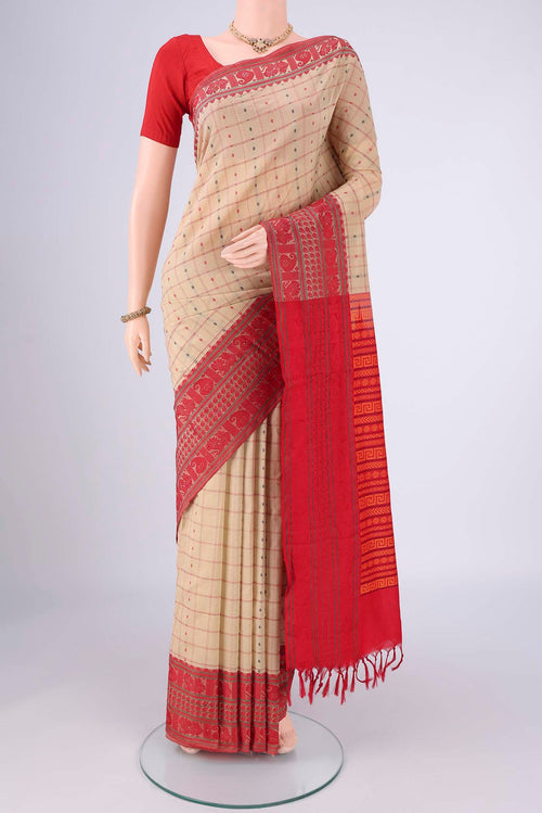 Beige Blended Poly Cotton Saree with Checked design on the body and Thread Border.  displayed on a mannequin
