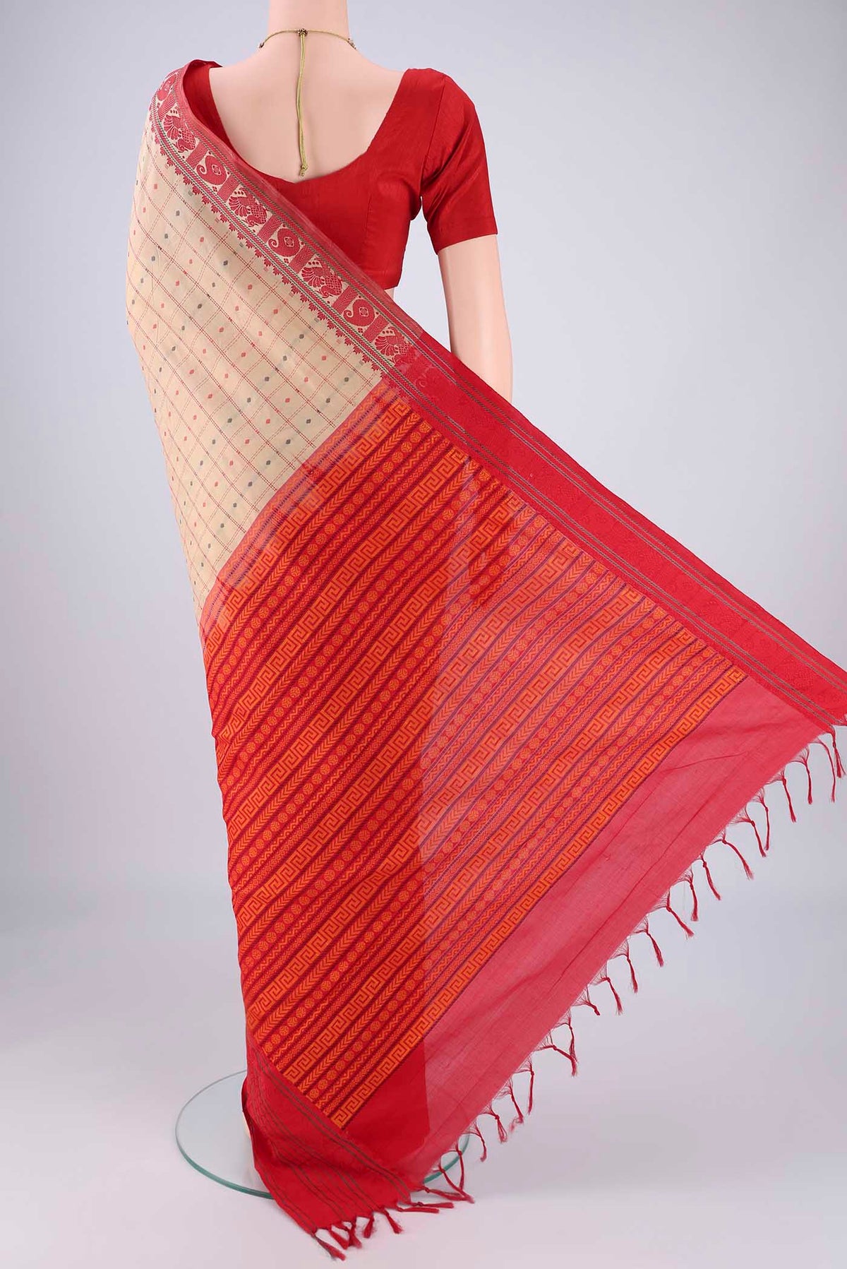 Flat view of Beige Blended Poly Cotton Saree with Checked design on the body and Thread Border. 