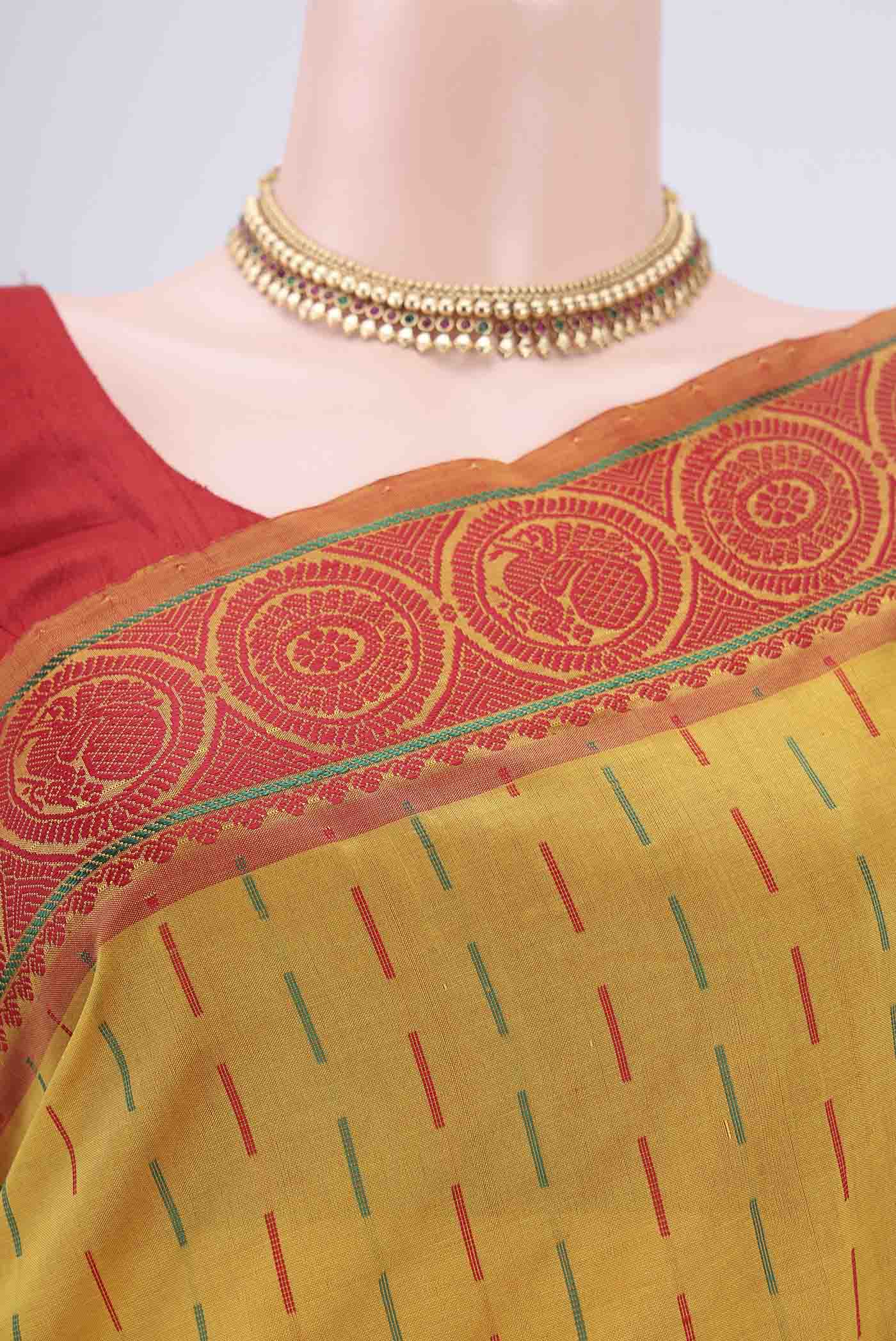 Border image of Mustard Blended Poly Cotton Saree with Thread Butta on the body and Thread Border. 