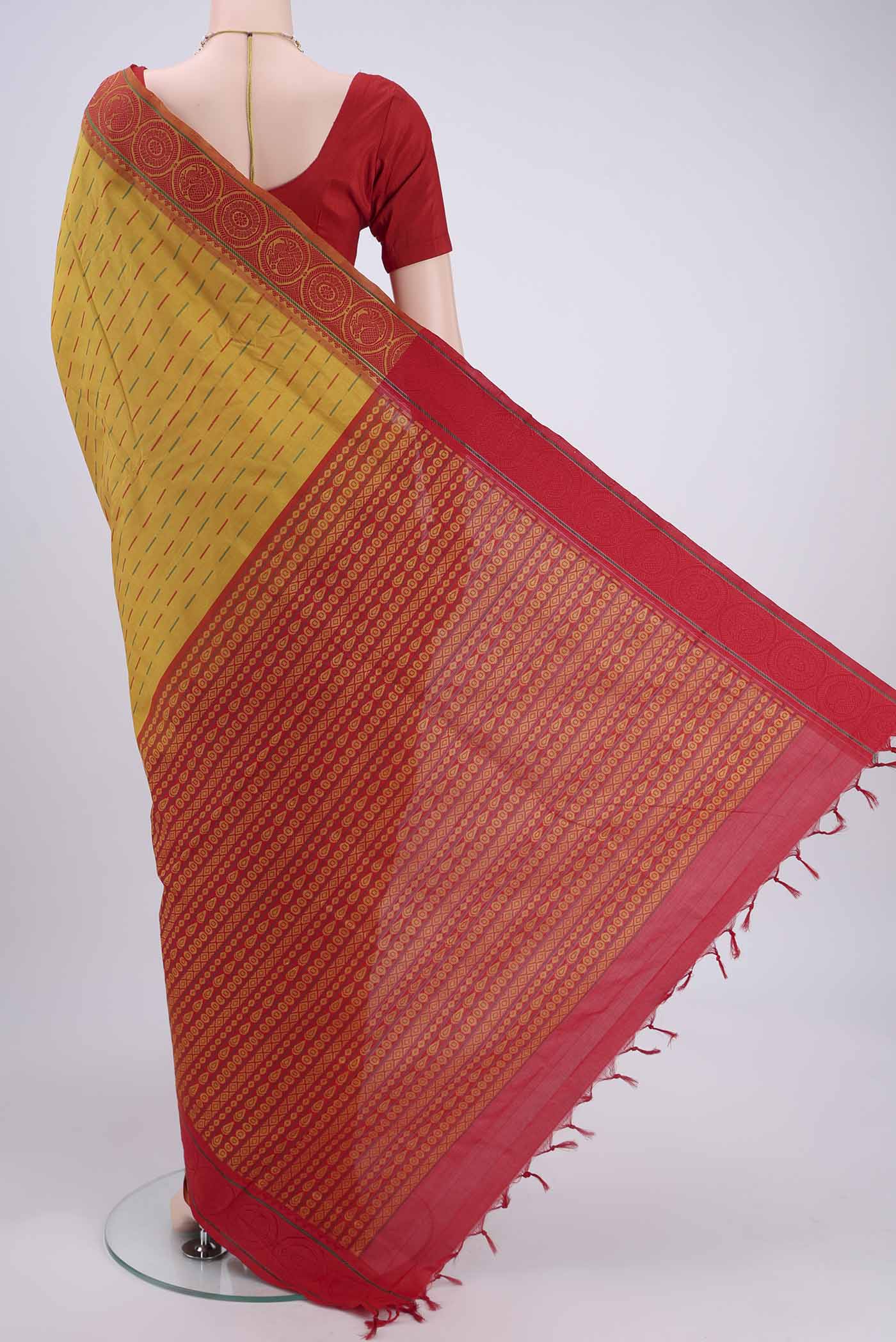Flat view of Mustard Blended Poly Cotton Saree with Thread Butta on the body and Thread Border. 