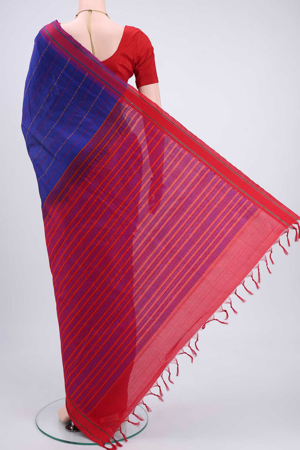 Flat view of Navy Blue Blended Poly Cotton Saree with Stripes on the body and Thread Border. 