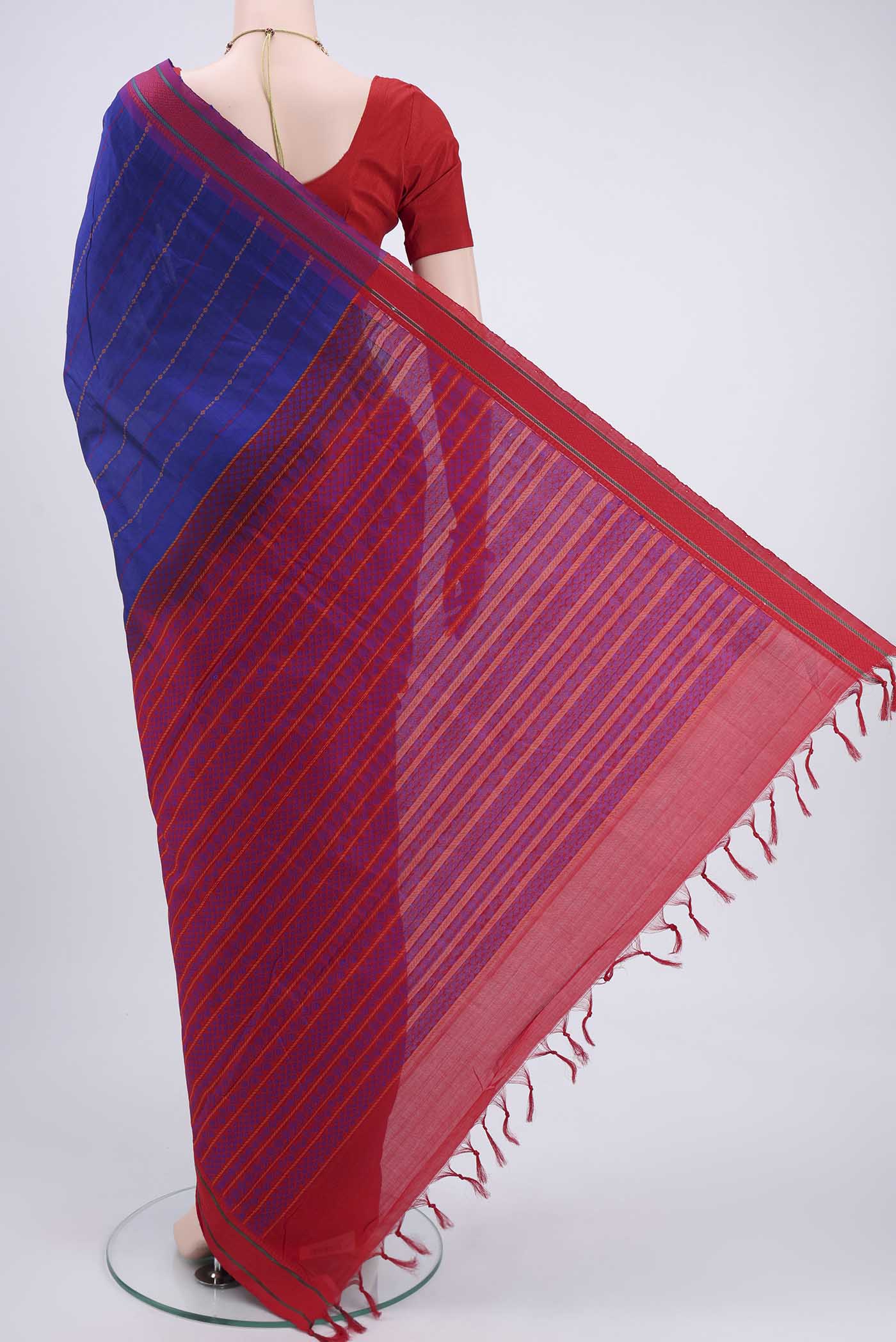 Flat view of Navy Blue Blended Poly Cotton Saree with Stripes on the body and Thread Border. 