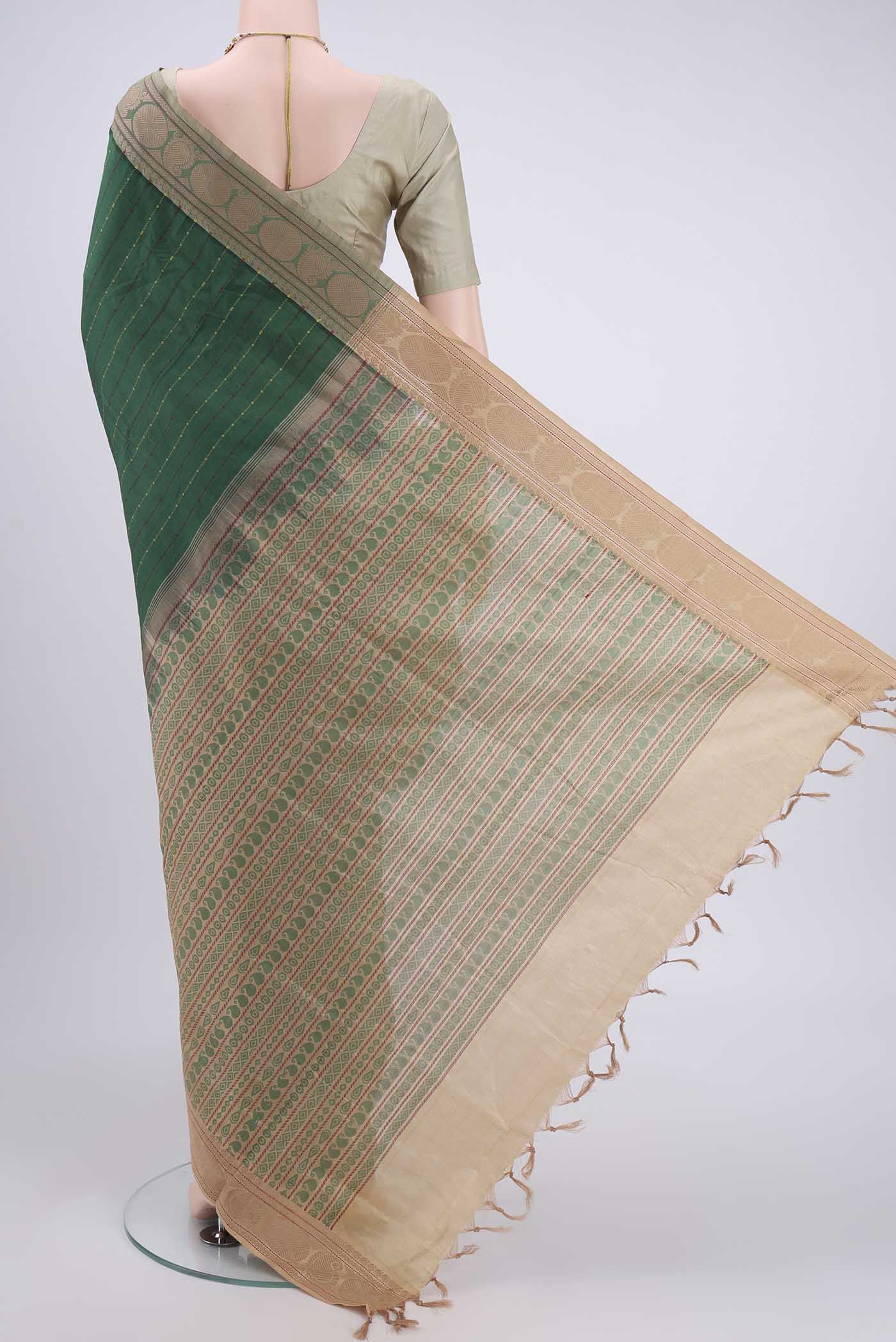Flat view of Bottle Green Blended Poly Cotton Saree with Stripes on the body and Thread Border. 