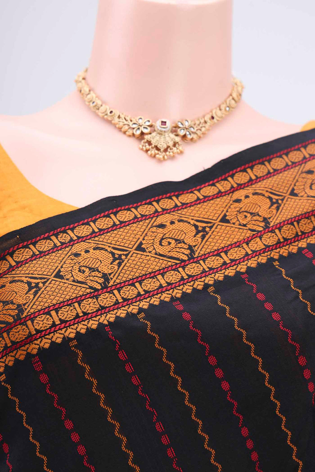 Border image of Black Blended Poly Cotton Saree with Stripes on the body and Thread Border. 
