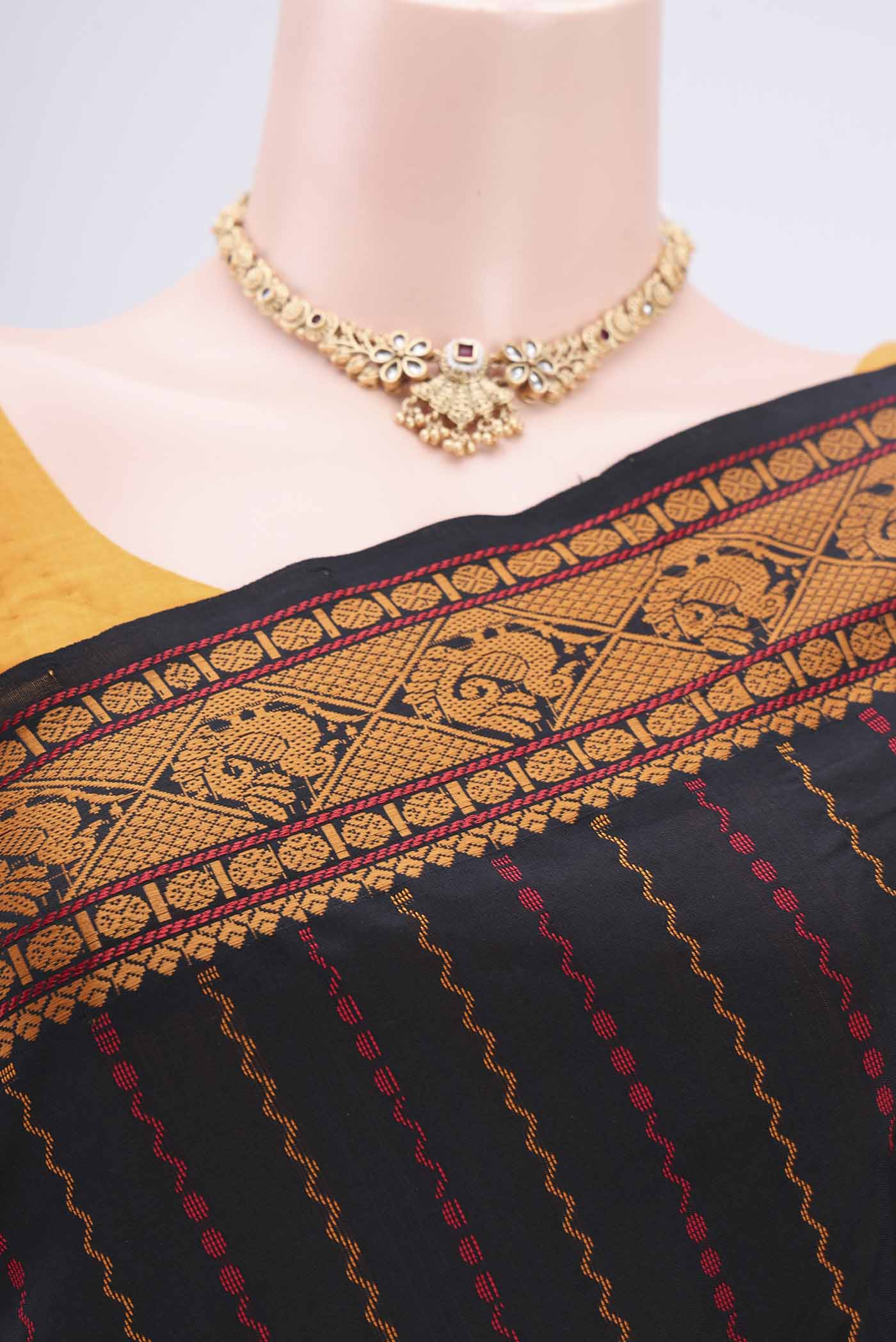 Border image of Black Blended Poly Cotton Saree with Stripes on the body and Thread Border. 