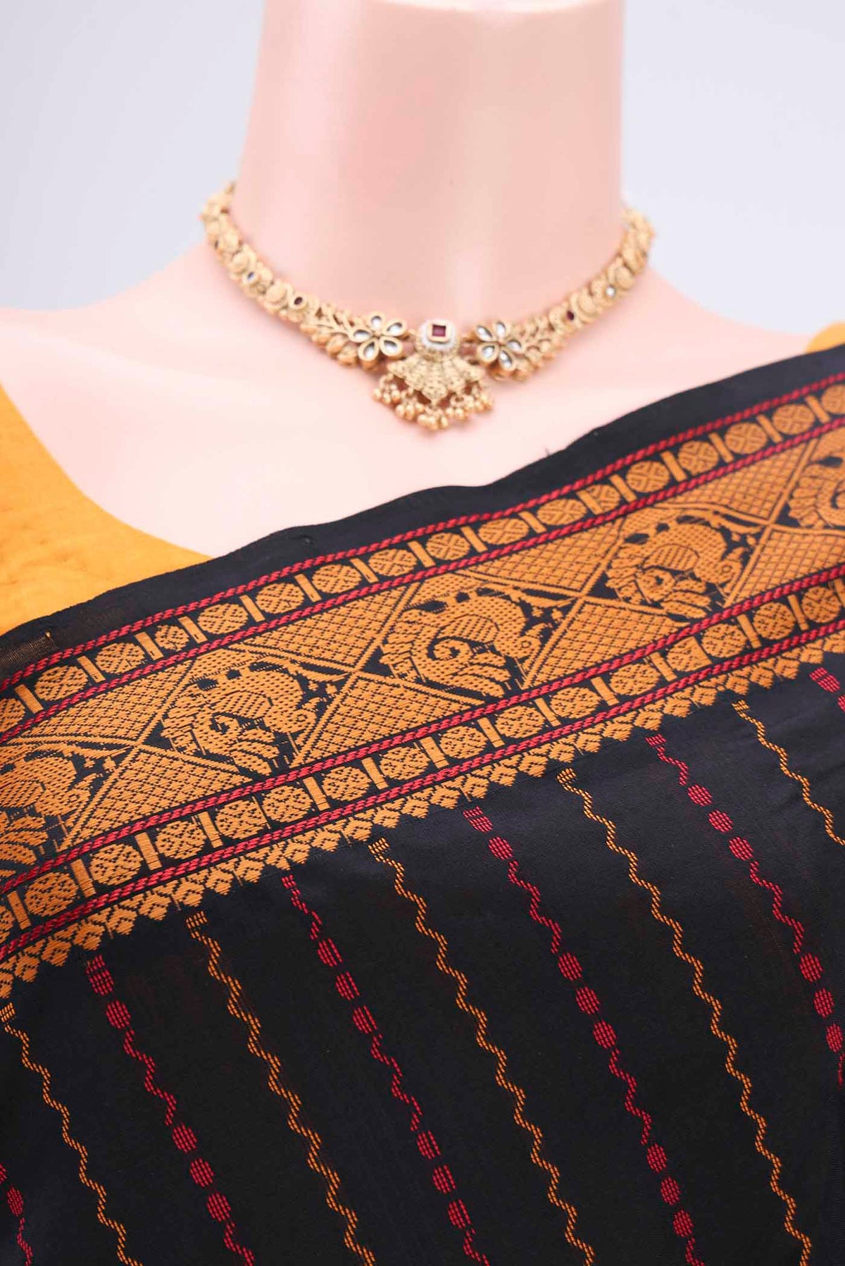 Border image of Black Blended Poly Cotton Saree with Stripes on the body and Thread Border. 