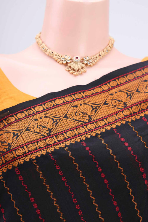 Border image of Black Blended Poly Cotton Saree with Stripes on the body and Thread Border. 