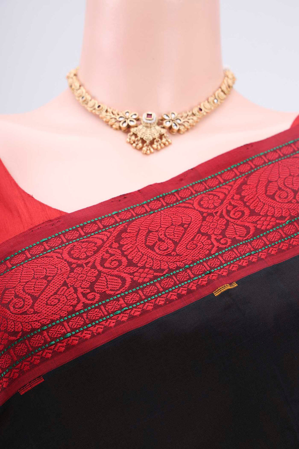 Border image of Black Blended Poly Cotton Saree with Thread Butta on the body and Thread Border. 
