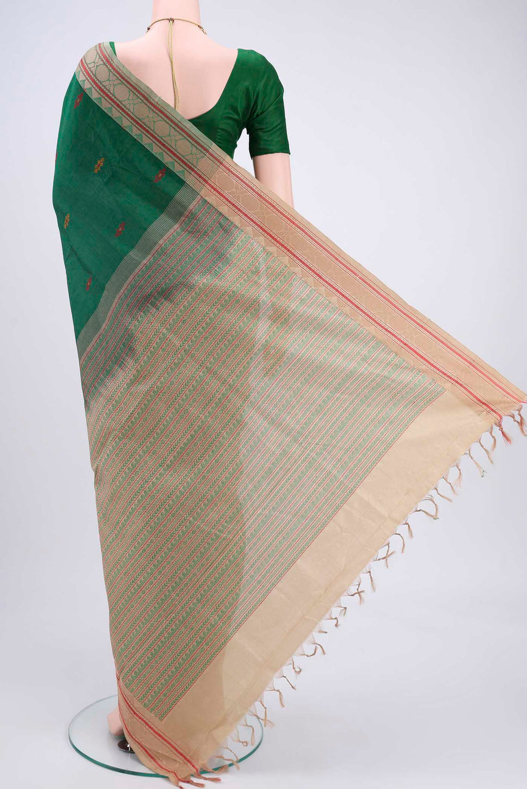 Flat view of Bottle Green Blended Poly Cotton Saree with Thread Butta on the body and Thread Border. 