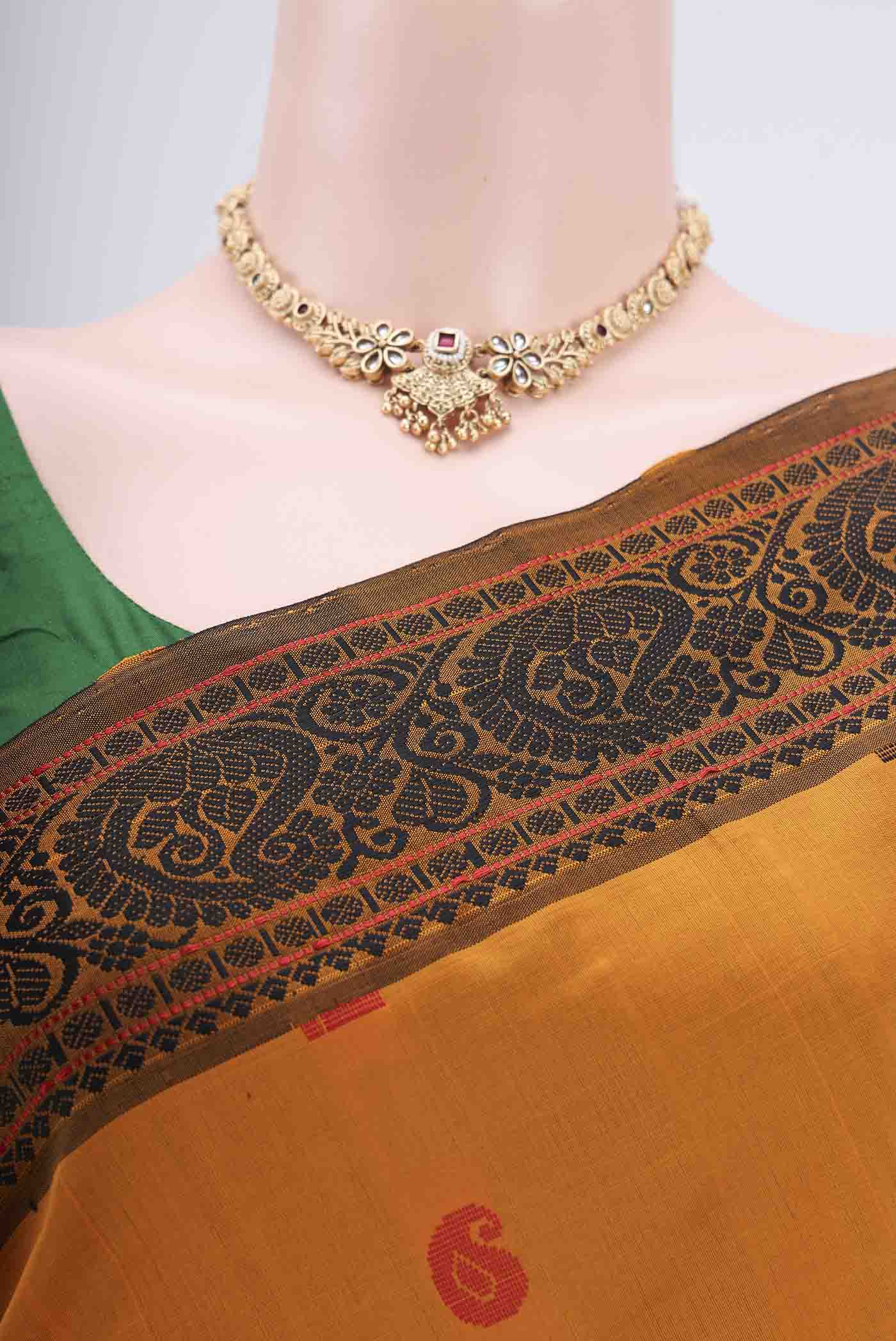 Border image of Mustard Blended Poly Cotton Saree with Thread Butta on the body and Thread Border. 