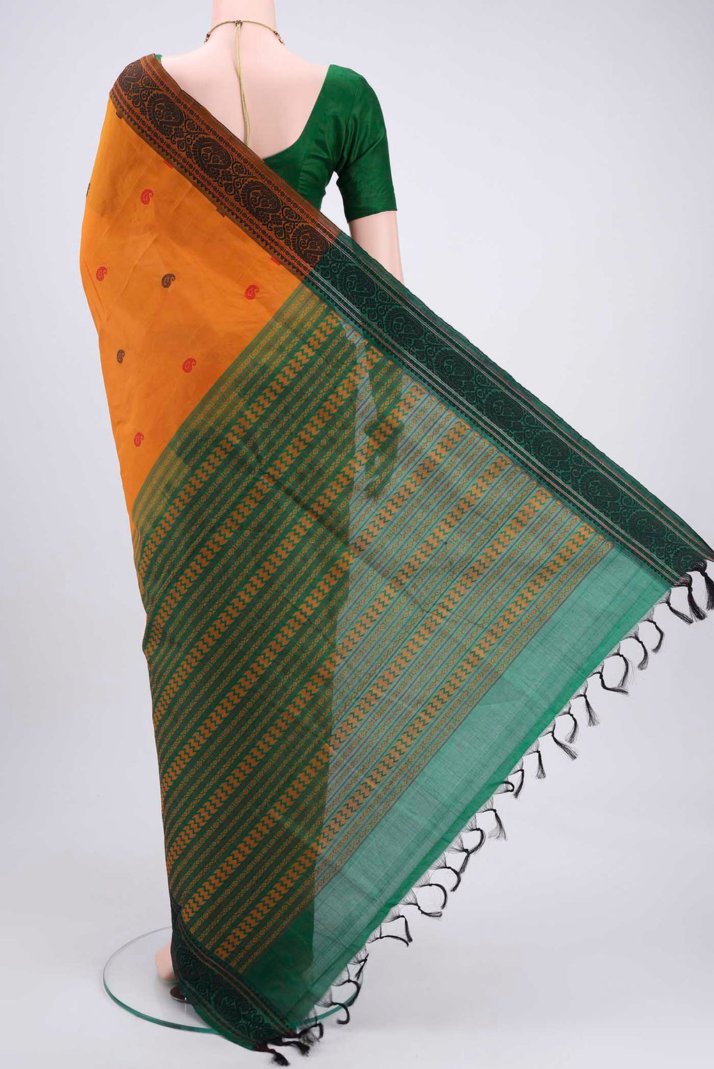 Flat view of Mustard Blended Poly Cotton Saree with Thread Butta on the body and Thread Border. 