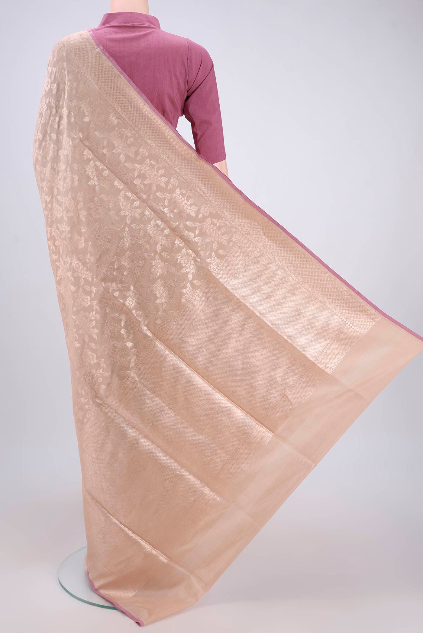 Flat view of Beige Banarasi Silk Saree with Zari Butta on the body and Zari Border. 