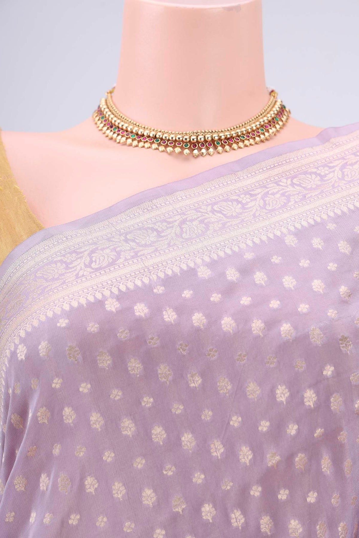 Border image of Lavender Dual Tone Banarasi Silk Saree with Zari Butta on the body and Zari Border. 