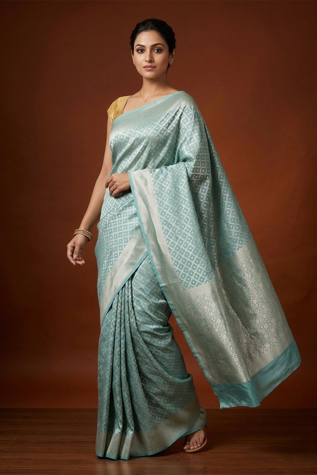 Model wearing a Light Blue Banarasi Silk Saree with Zari Brocade on the body and Zari Border.