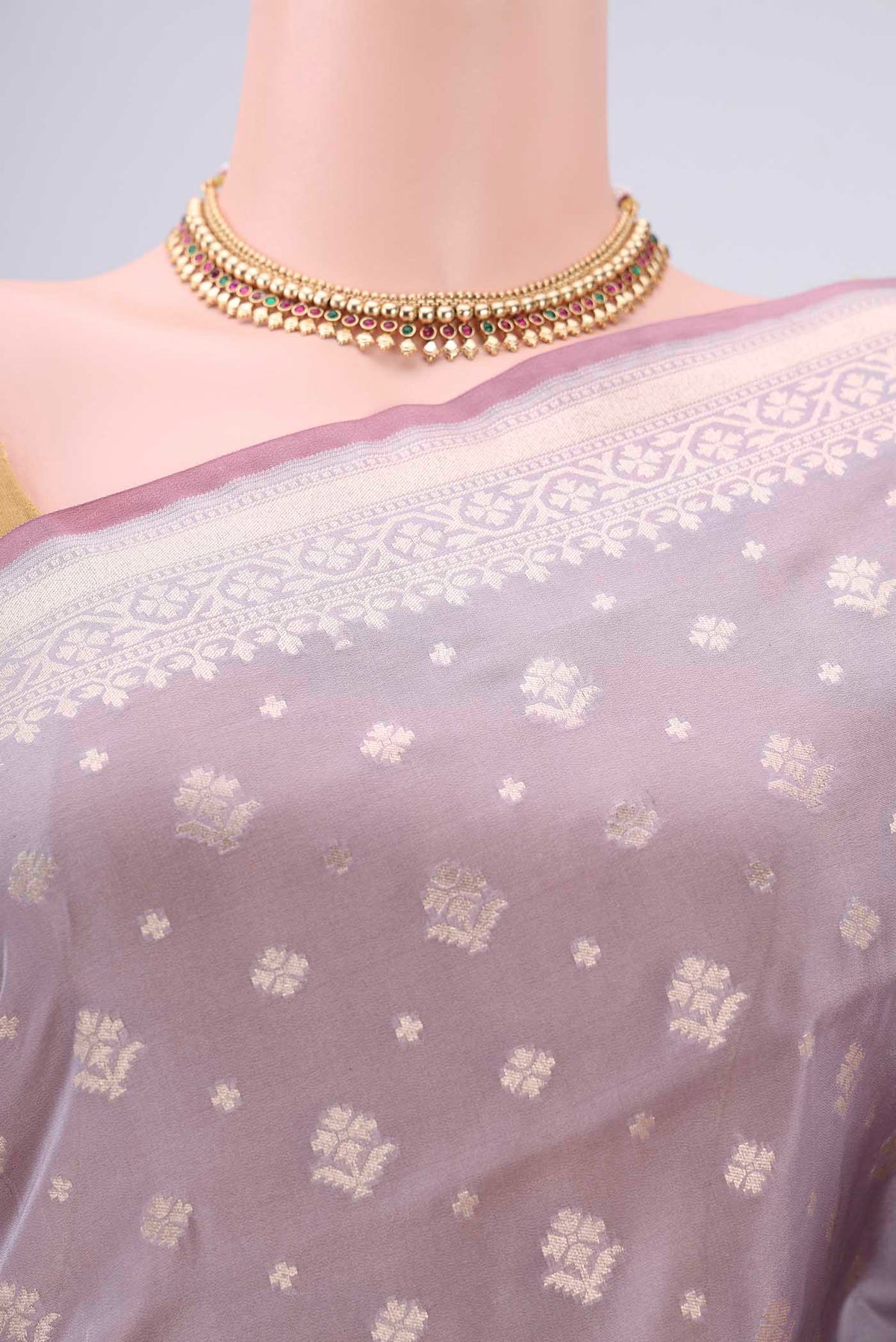 Border image of Lavender Dual Tone Banarasi Silk Saree with Zari Butta on the body and Zari Border. 