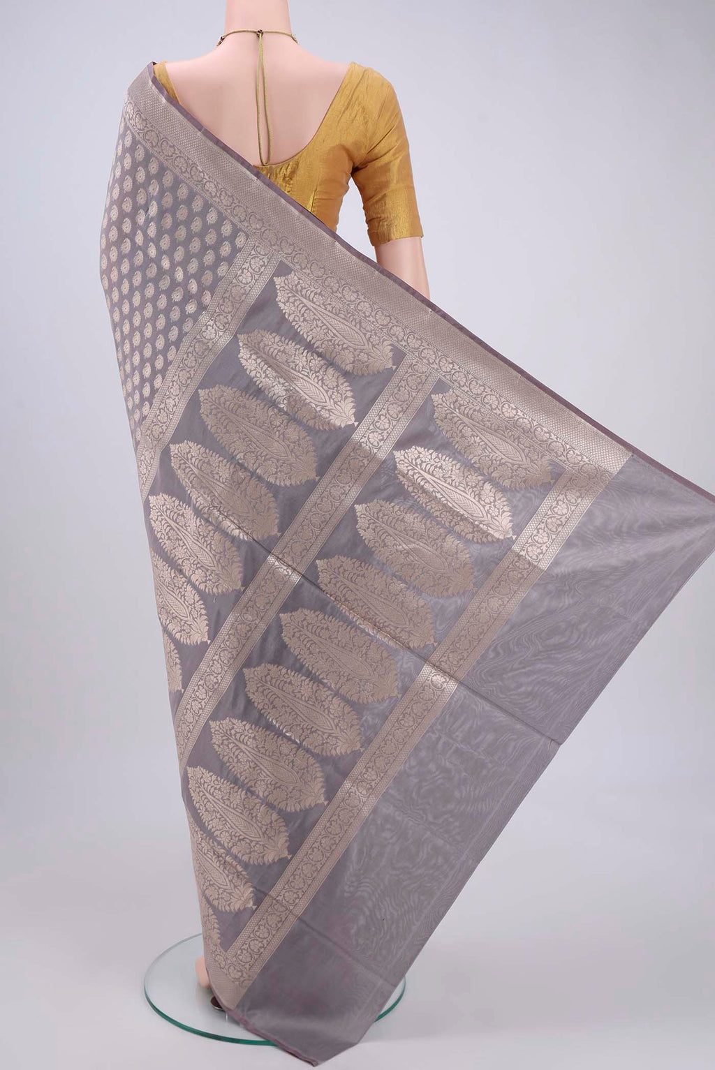 Flat view of Grey Bangalore Silk Saree with Zari Butta on the body and Zari Border. 
