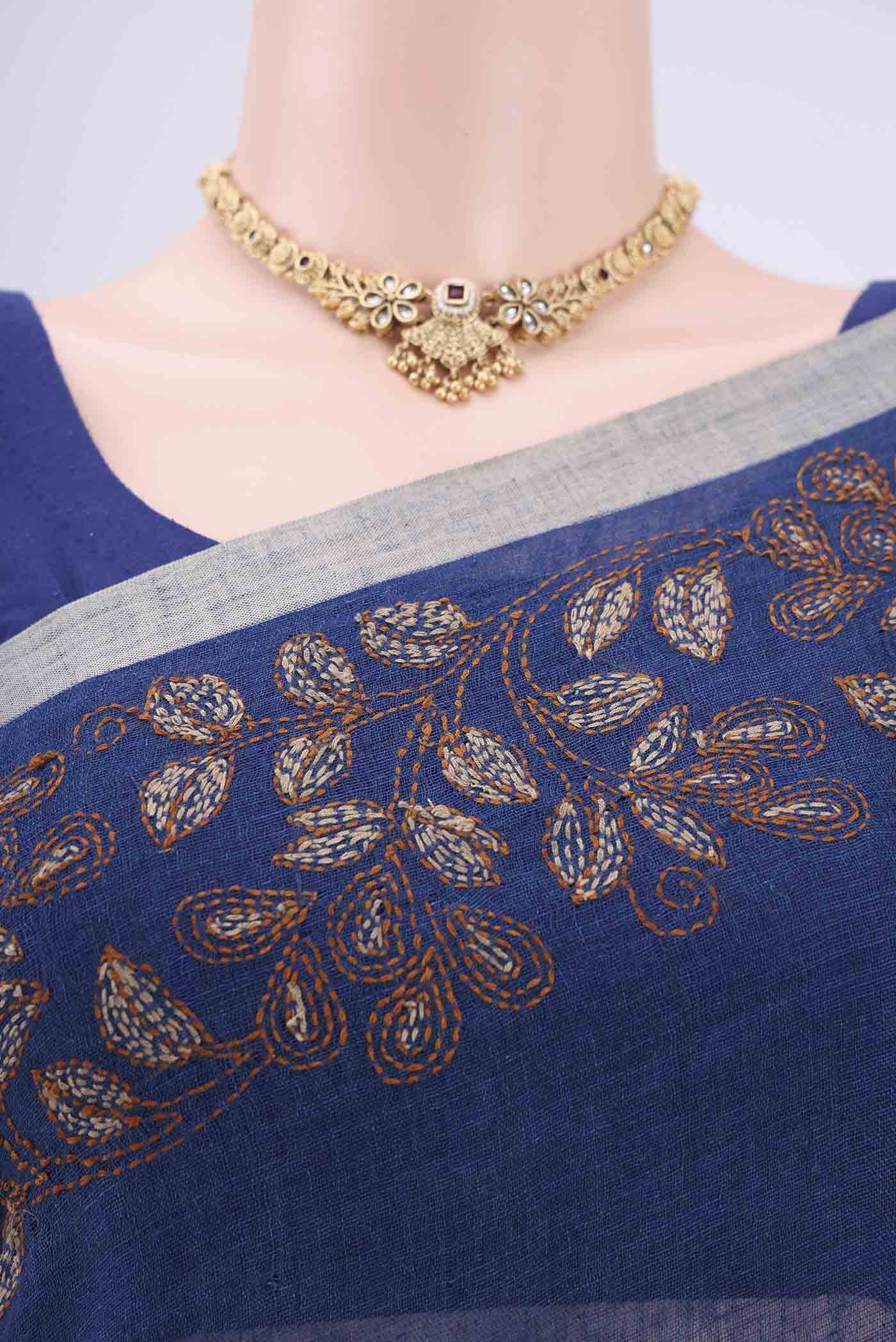 Border image of Blue Linen Saree with Kantha Work on the body and Plain Border. 
