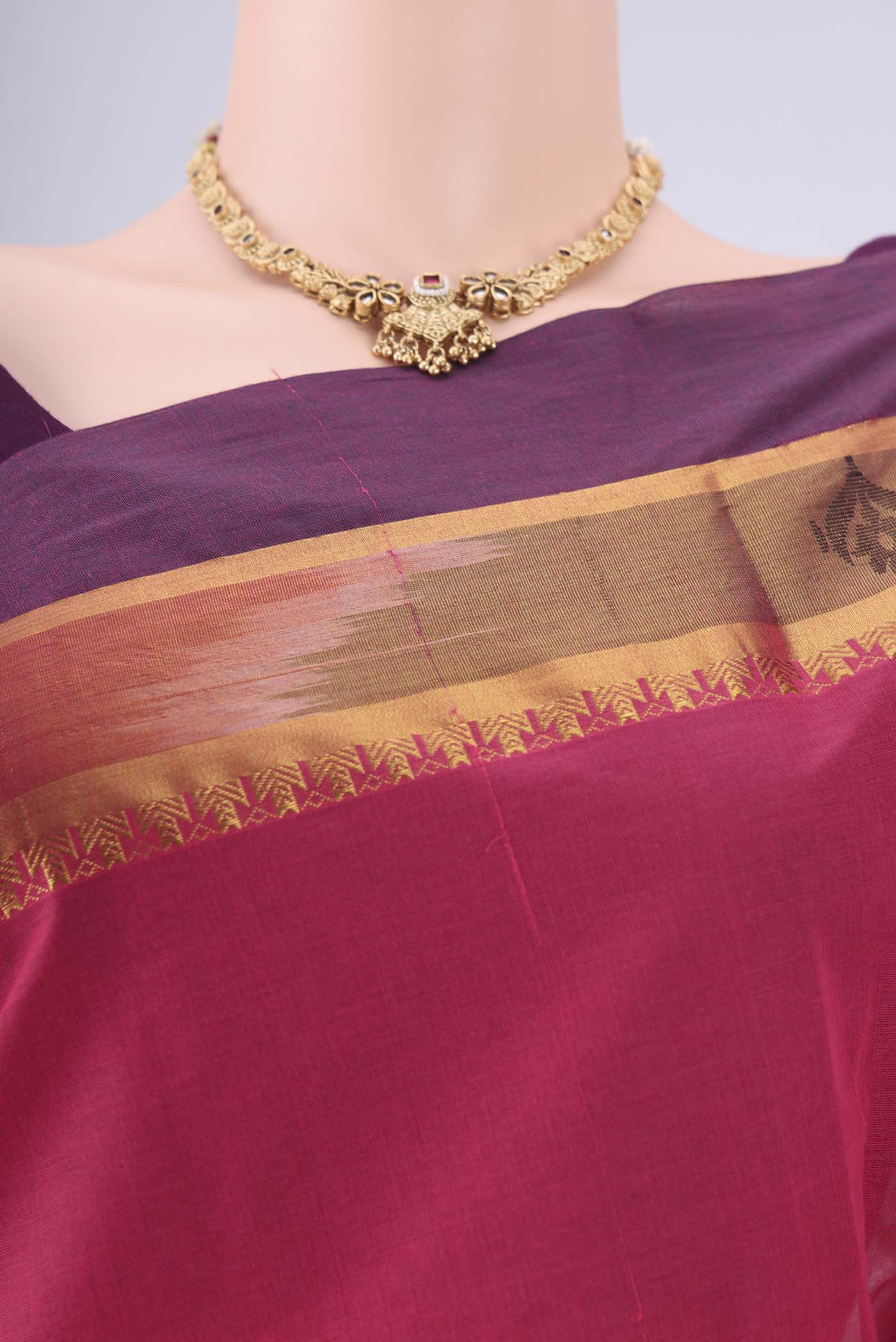 Border image of Pink Kanchi Cotton Saree with Thread Butta on the body and Zari Border. 