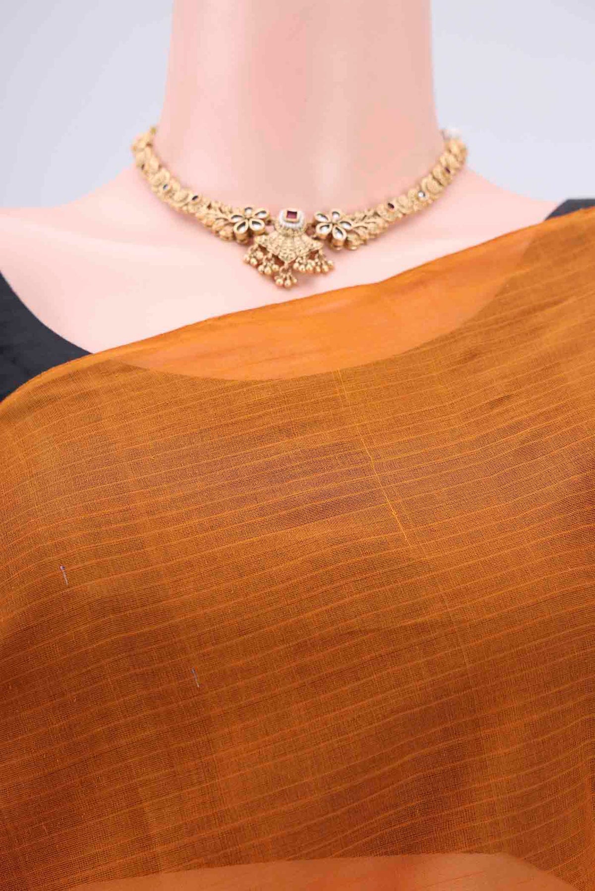 Border image of Mustard Kanchi Cotton Saree with Checked design on the body and Zari Border. 