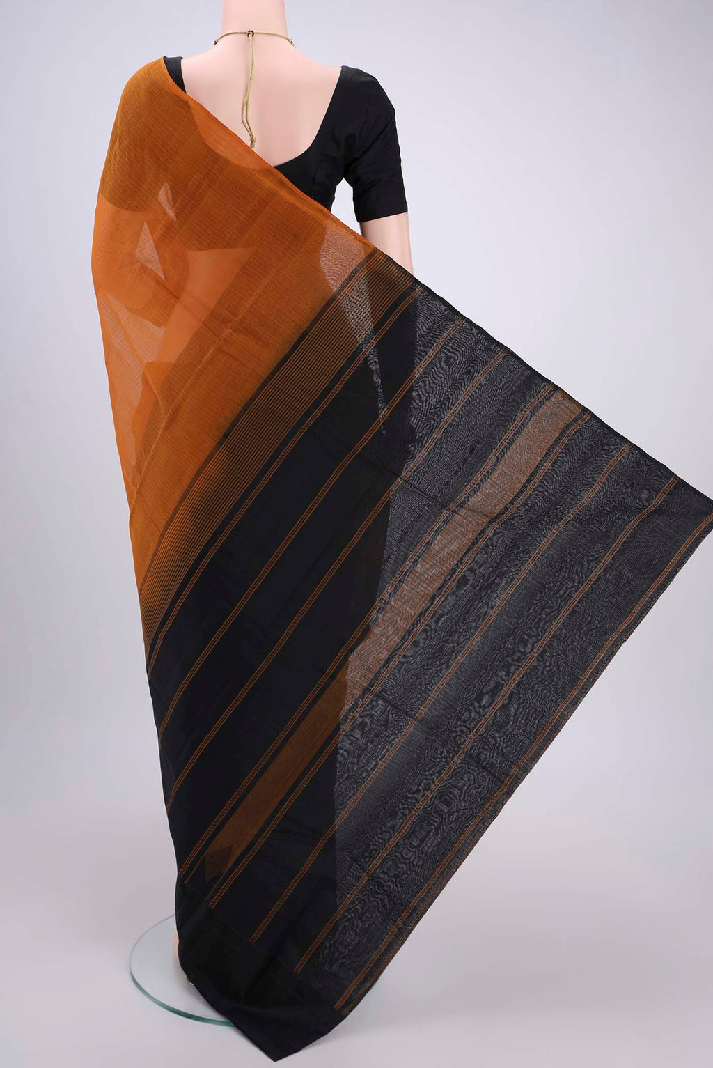 Flat view of Mustard Kanchi Cotton Saree with Checked design on the body and Zari Border. 