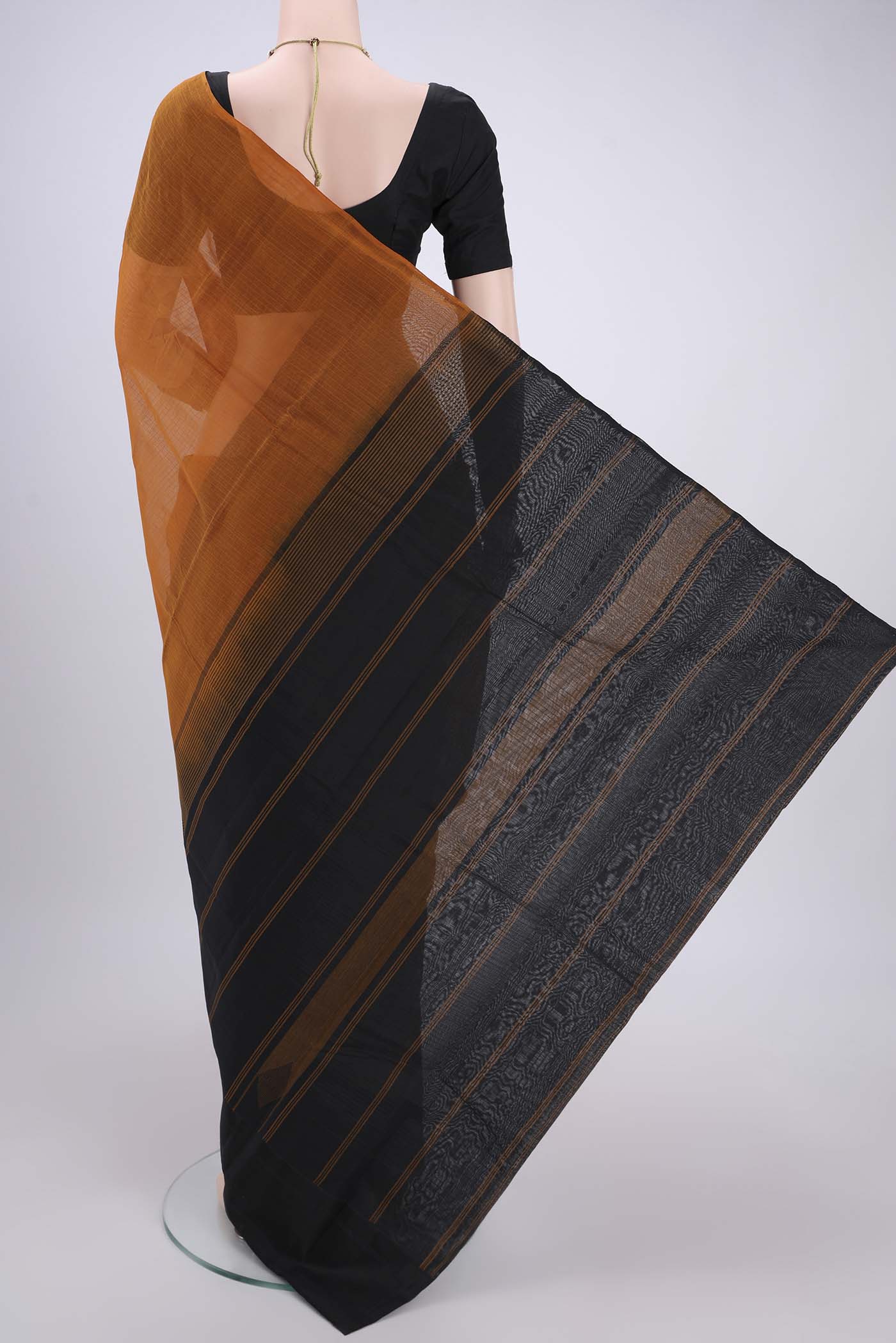 Flat view of Mustard Kanchi Cotton Saree with Checked design on the body and Zari Border. 
