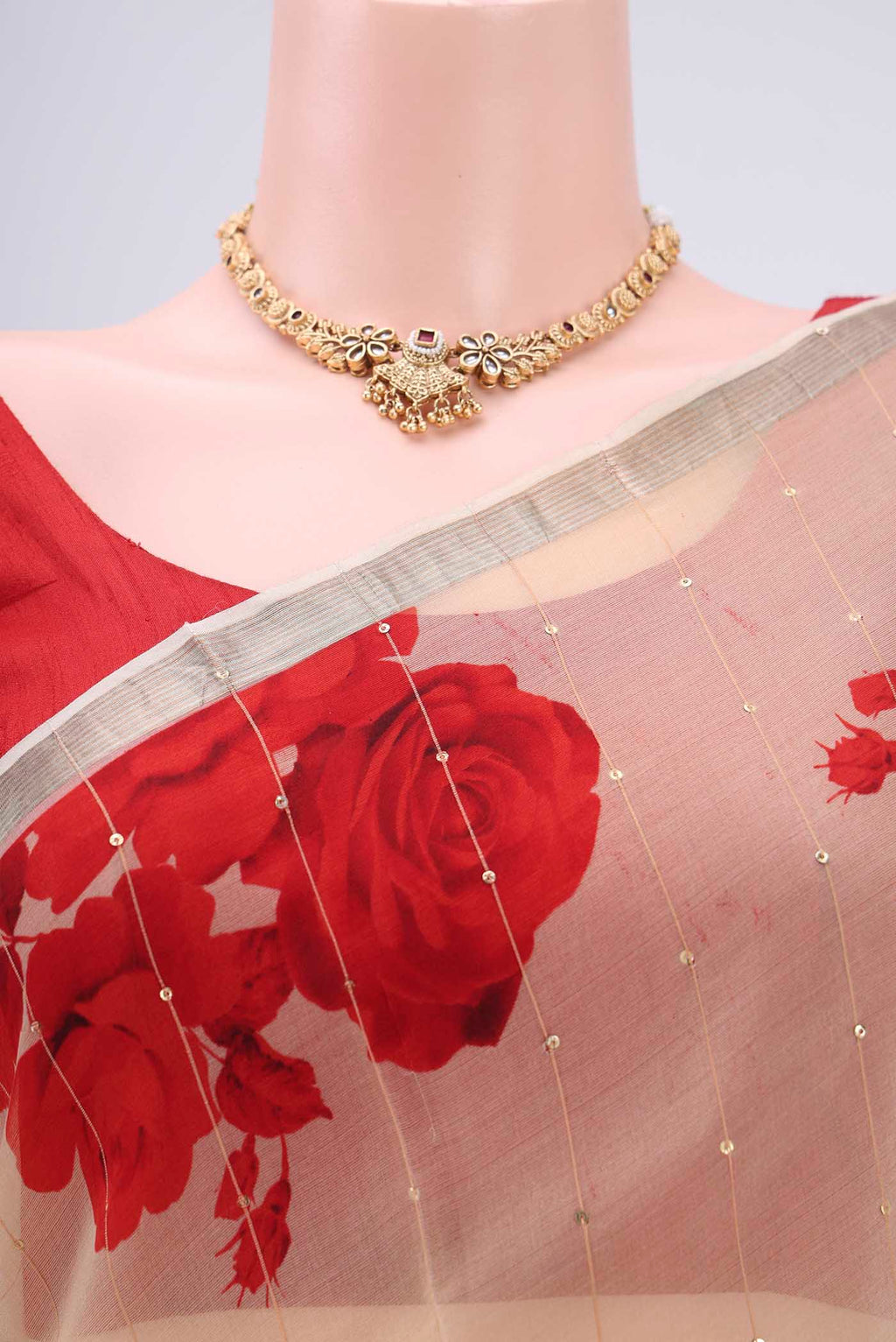 Border image of Beige Organza Silk Saree with Printed design on the body and Zari Border. 