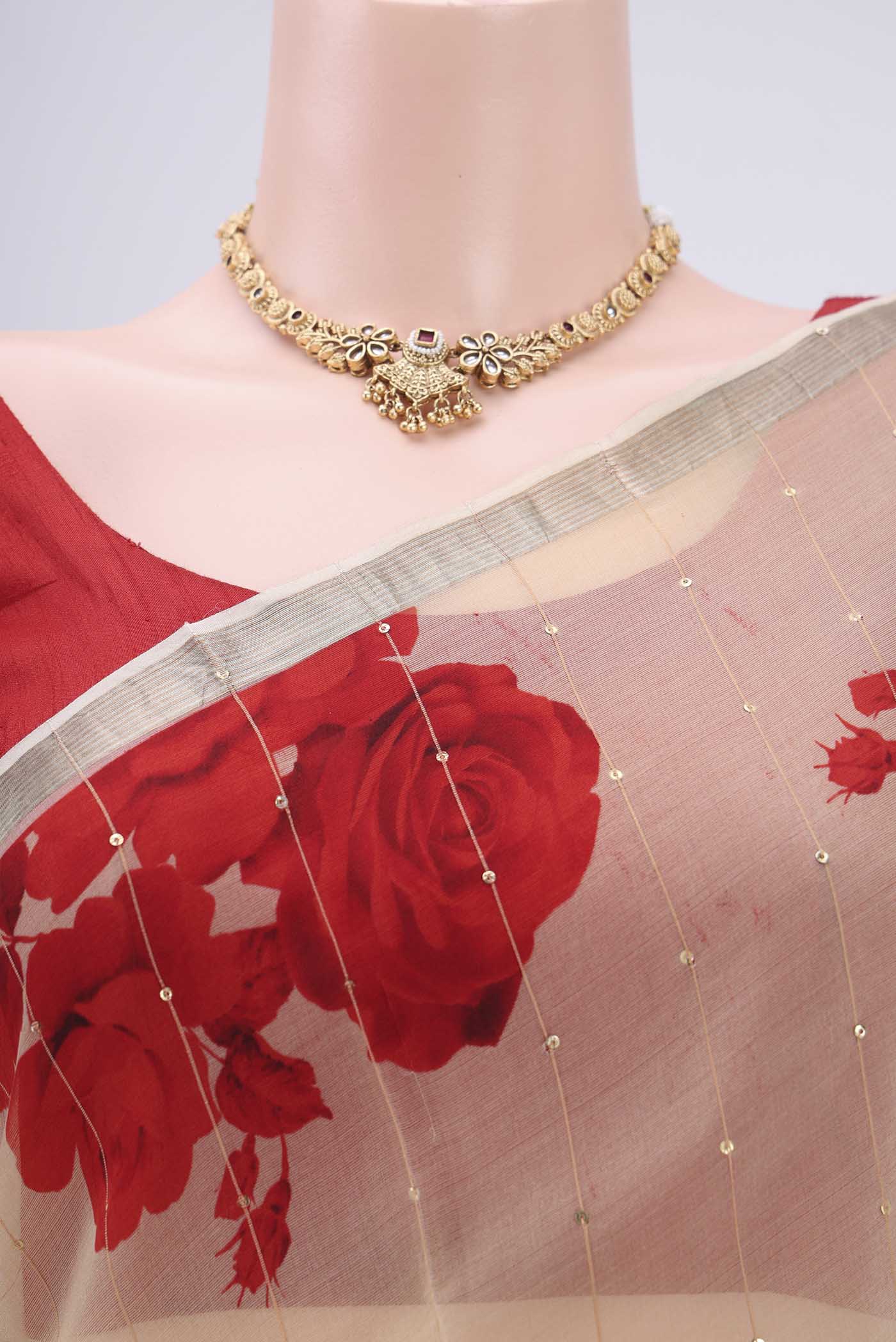 Border image of Beige Organza Silk Saree with Printed design on the body and Zari Border. 