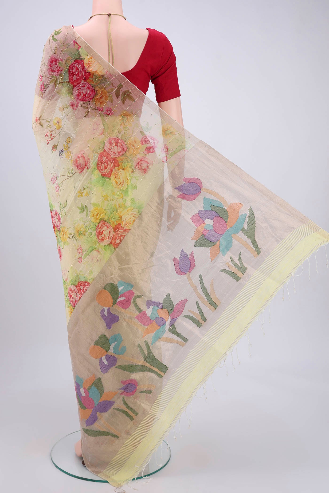 Flat view of Lemon Yellow Organza Silk Saree with Printed design on the body and Zari Border. 
