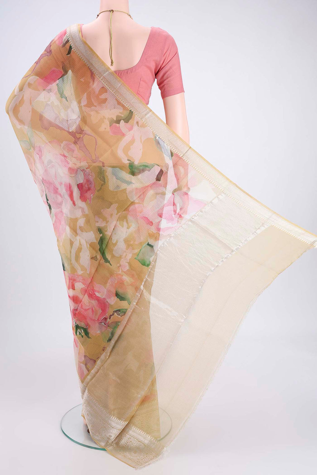 Flat view of Mustard Kota Silk Saree with Printed design on the body and Zari Border. 