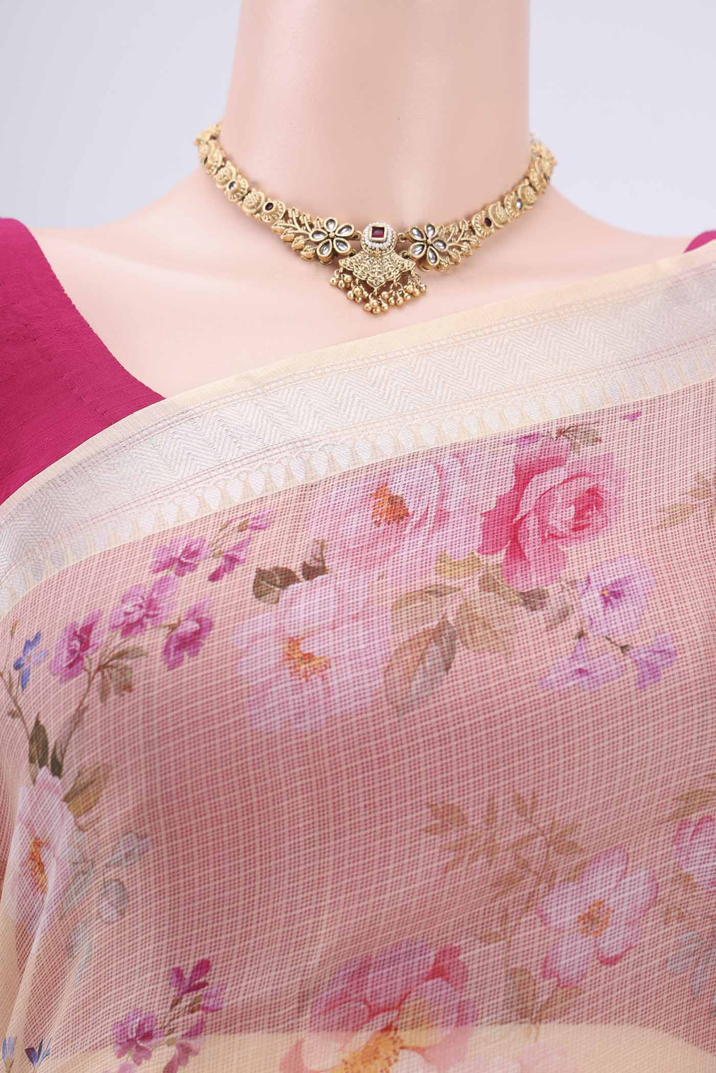 Border image of Cream Kota Silk Saree with Floral Print on the body and Zari Border. 