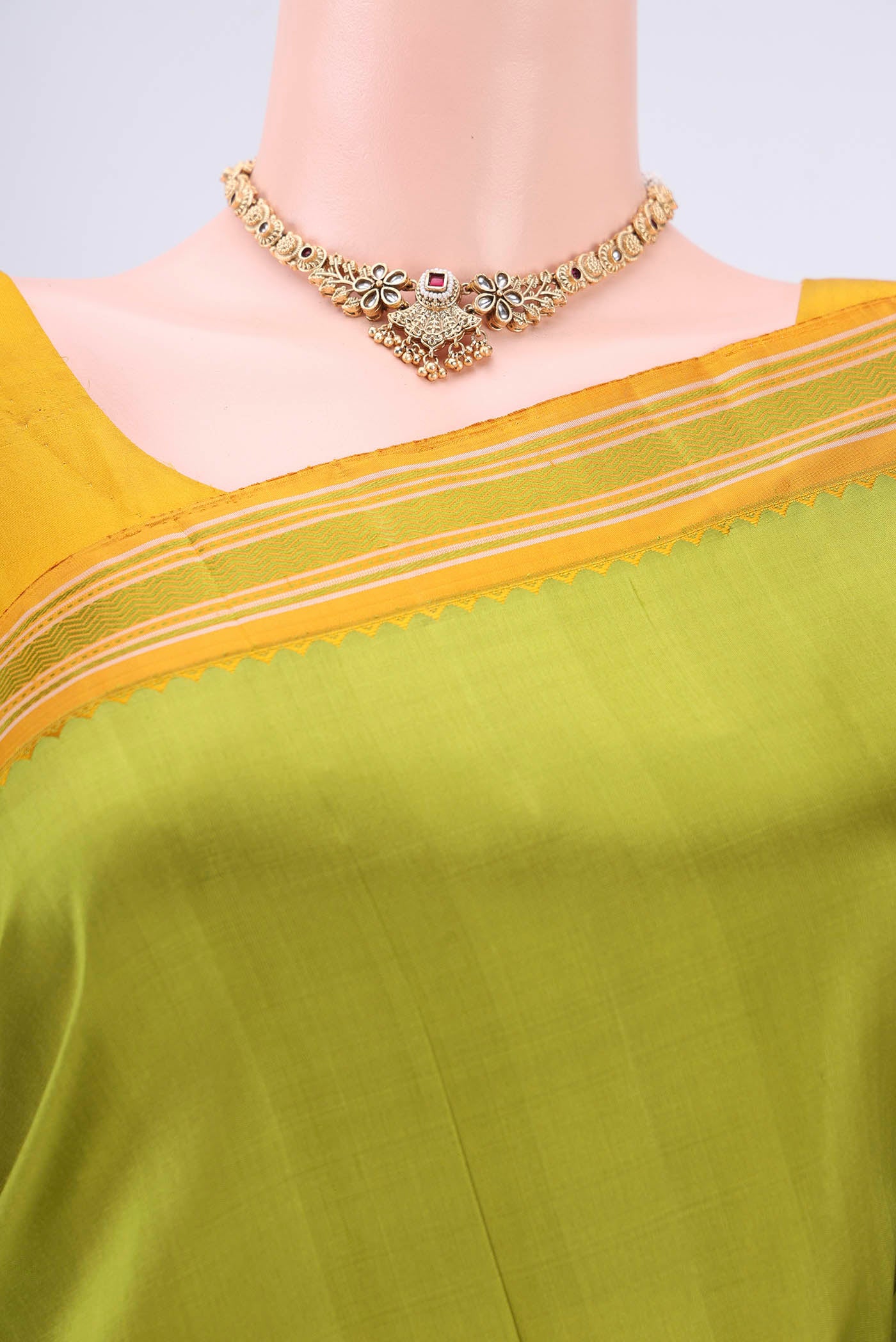 Border image of Light Green Kanjivaram Silk Saree with Plain Body and Thread Border. 