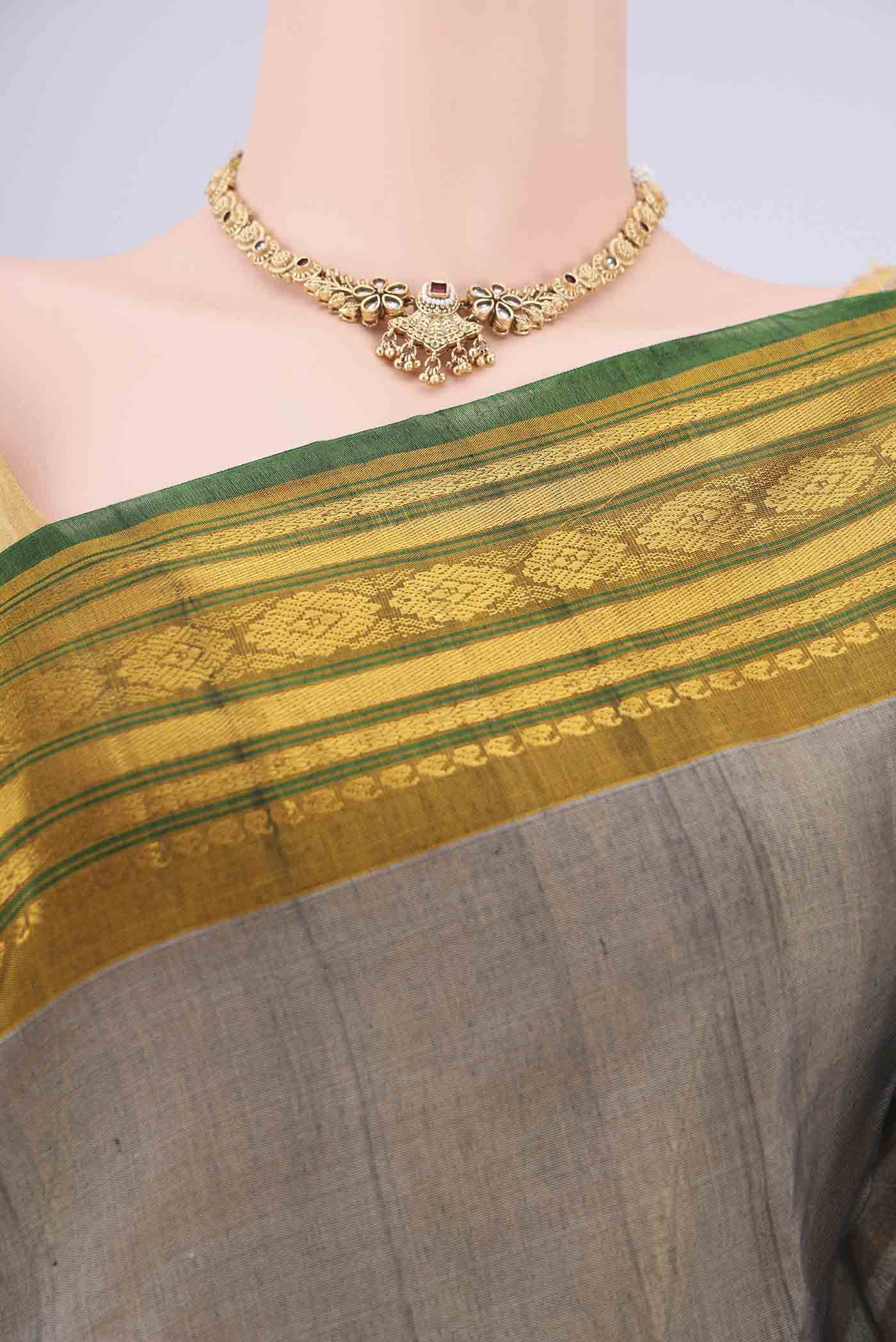 Border image of Grey Gadwal cotton Saree with Plain Body and Zari Border. 