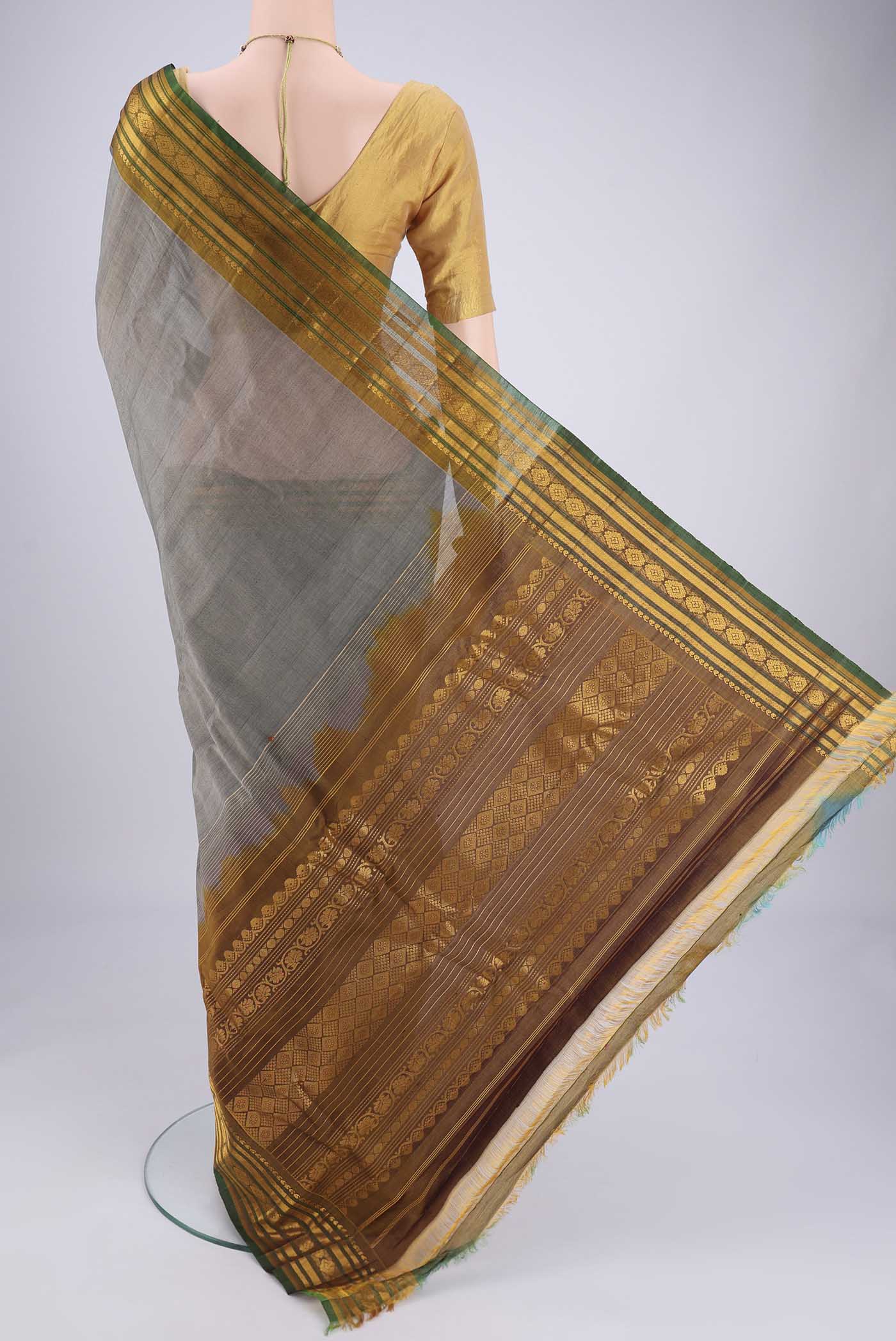 Flat view of Grey Gadwal cotton Saree with Plain Body and Zari Border. 