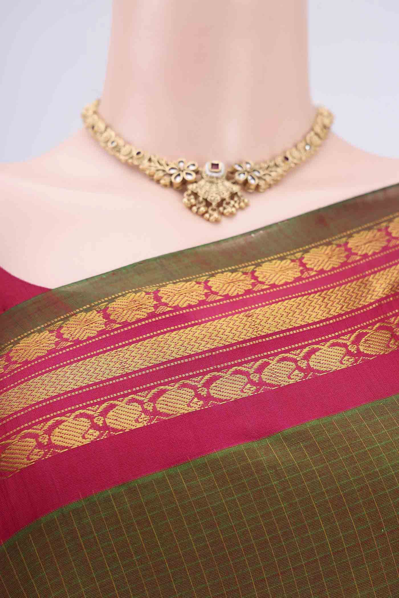 Border image of Light Green Dual Tone Gadwal Silk Cotton Saree with Checked design on the body and Silk Border. 