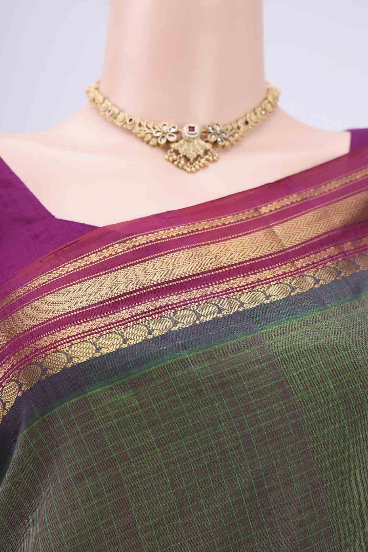 Border image of Green Gadwal Silk Cotton Saree with Stripes on the body and Silk Border. 