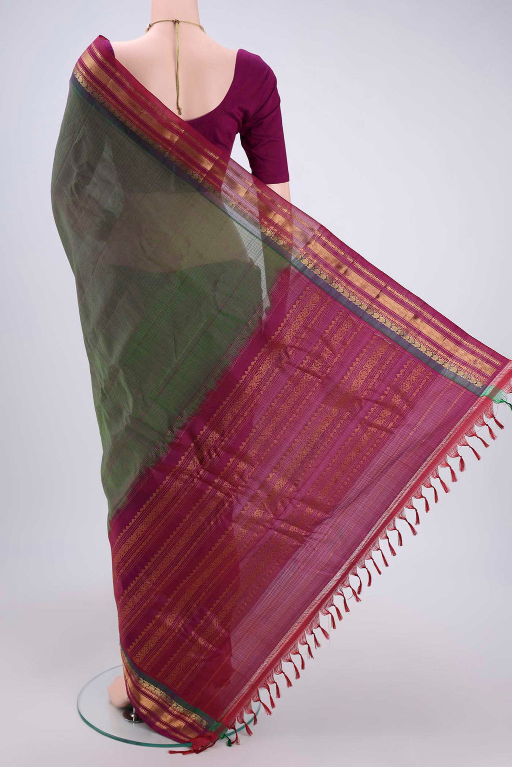 Flat view of Green Gadwal Silk Cotton Saree with Stripes on the body and Silk Border. 