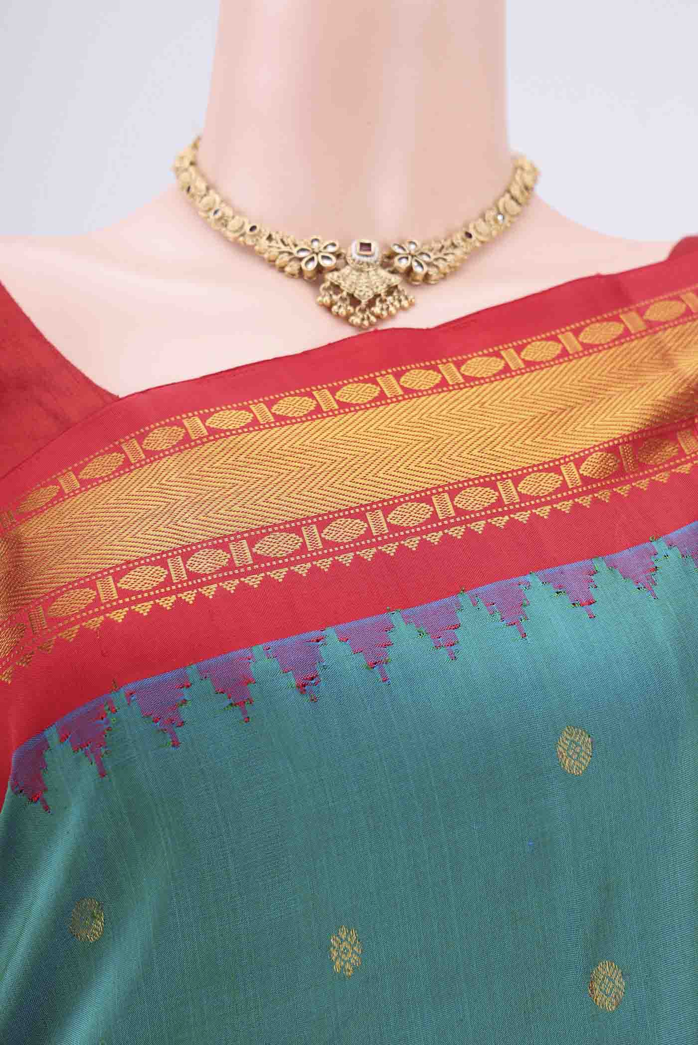Border image of Sea Green Dual Tone Gadwal Silk Saree with Zari Butta on the body and Zari Border. 