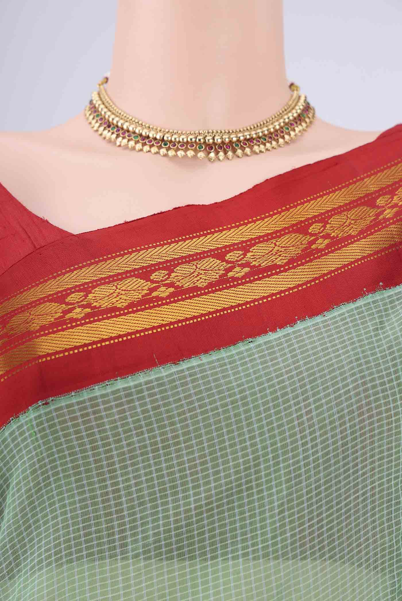 Border image of Green Gadwal cotton Saree with Checked design on the body and Zari Border. 