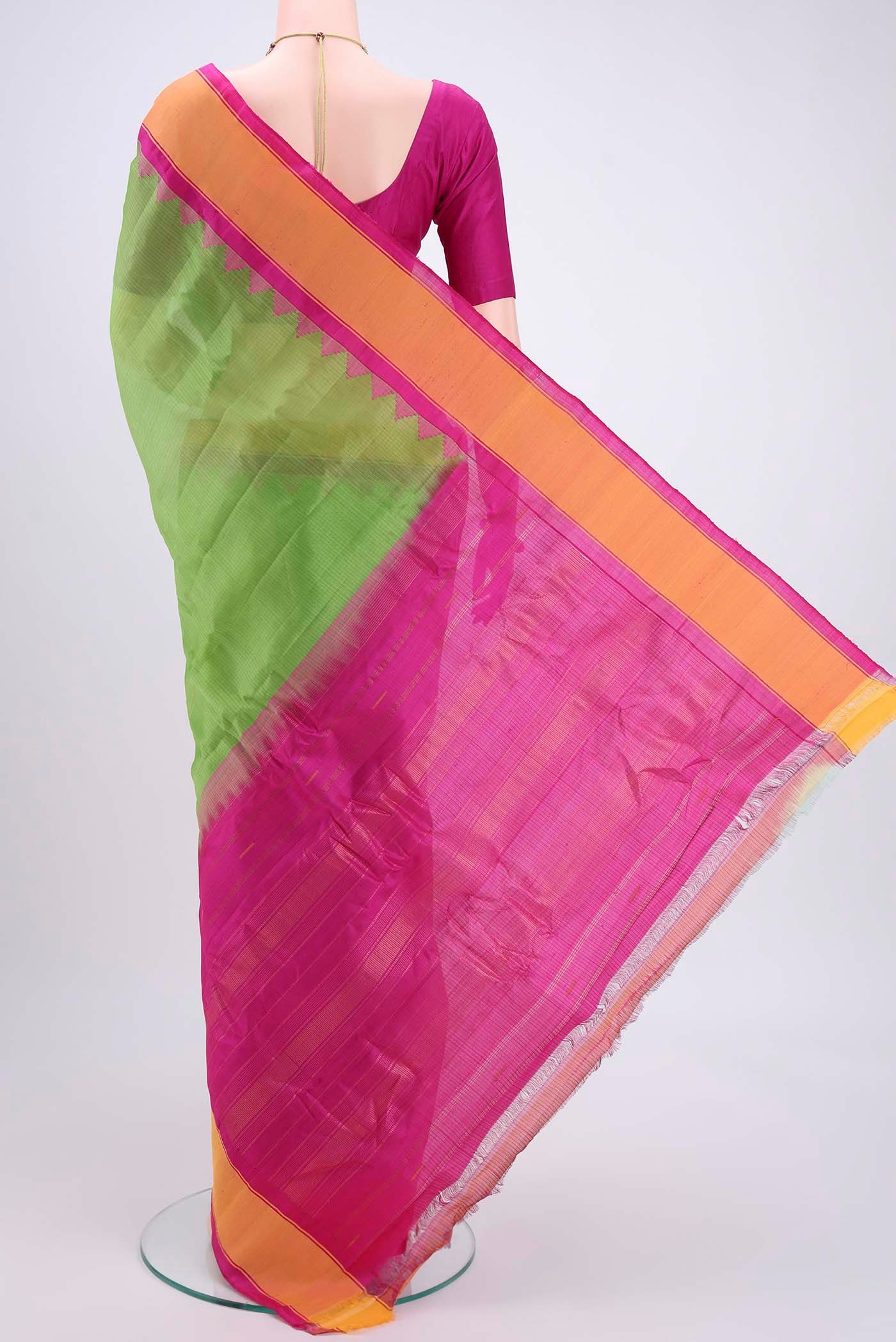 Flat view of Parrot Green Gadwal Silk Saree with Checked design on the body and Zari Border. 