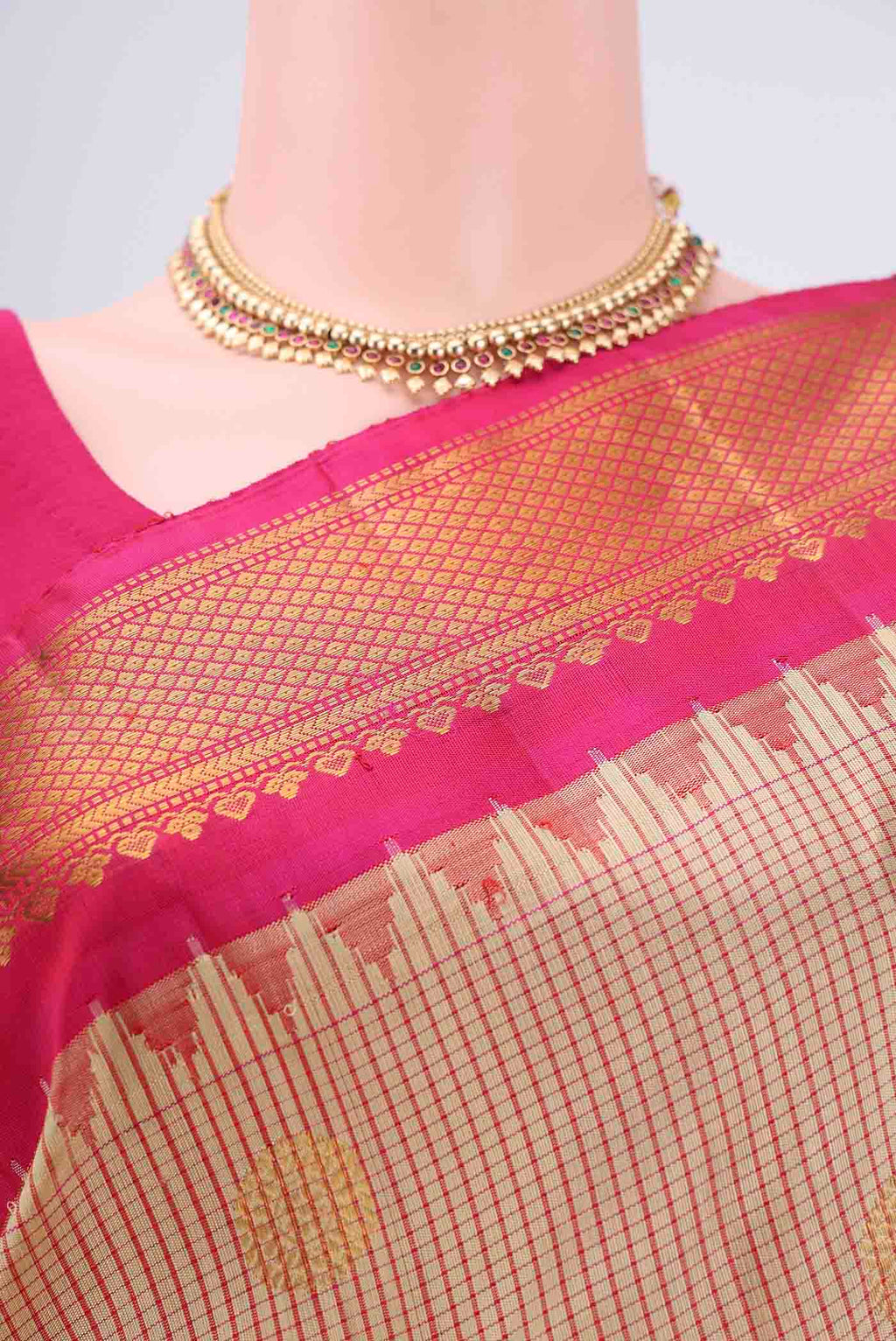 Border image of Beige Gadwal Silk Saree with Checked design on the body and Zari Border. 