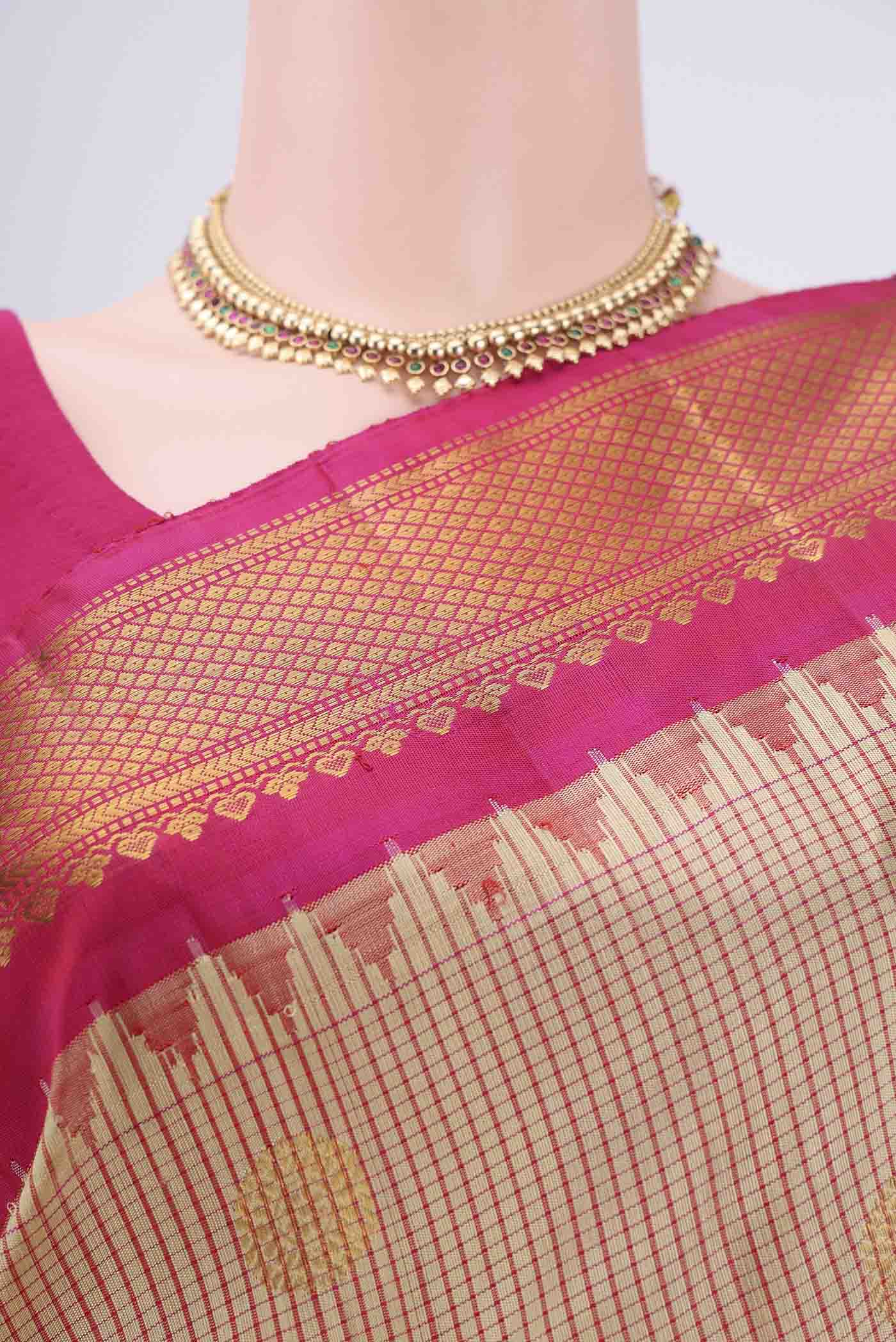 Border image of Beige Gadwal Silk Saree with Checked design on the body and Zari Border. 