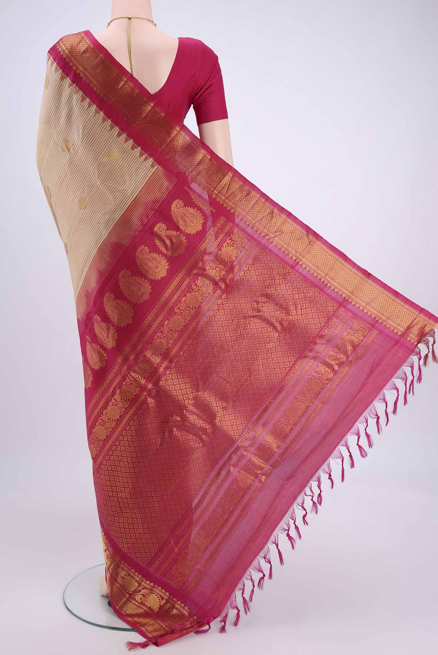 Flat view of Beige Gadwal Silk Saree with Checked design on the body and Zari Border. 