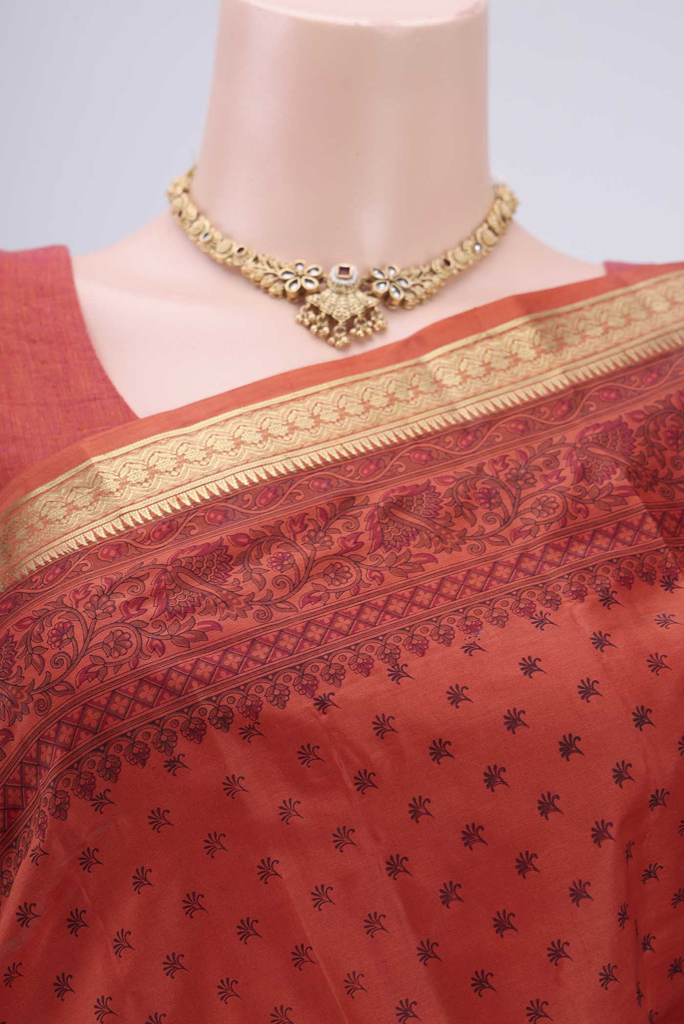Border image of Imperial Red Printed Silk Saree with Printed design on the body and Zari Border. 