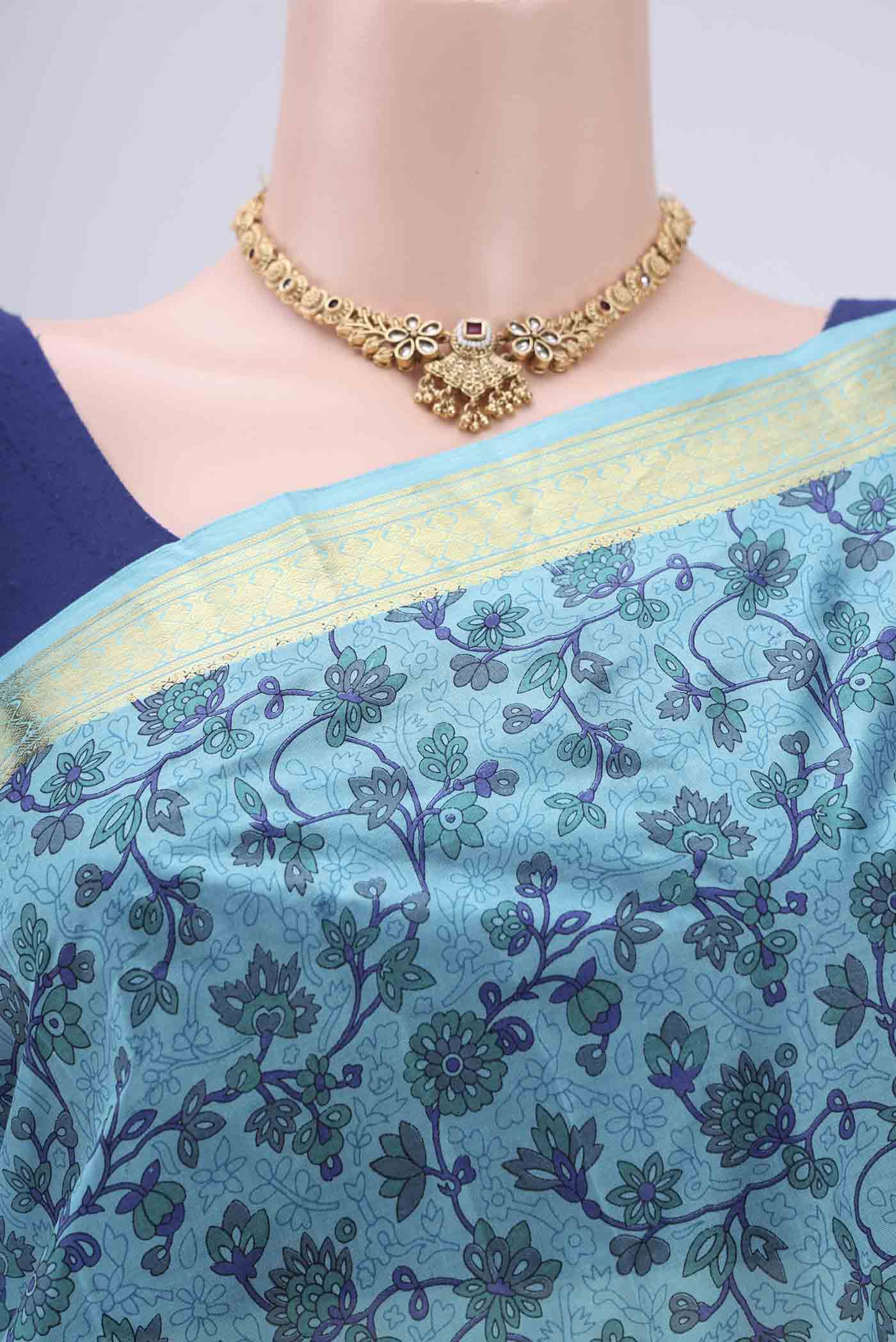 Border image of Sky Blue Printed Silk Saree with Printed design on the body and Zari Border. 