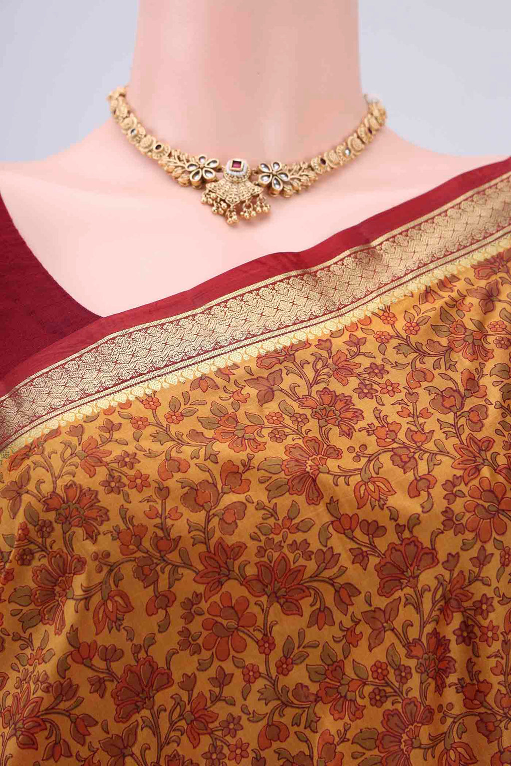Border image of Mustard Printed Silk Saree with Printed design on the body and Zari Border. 