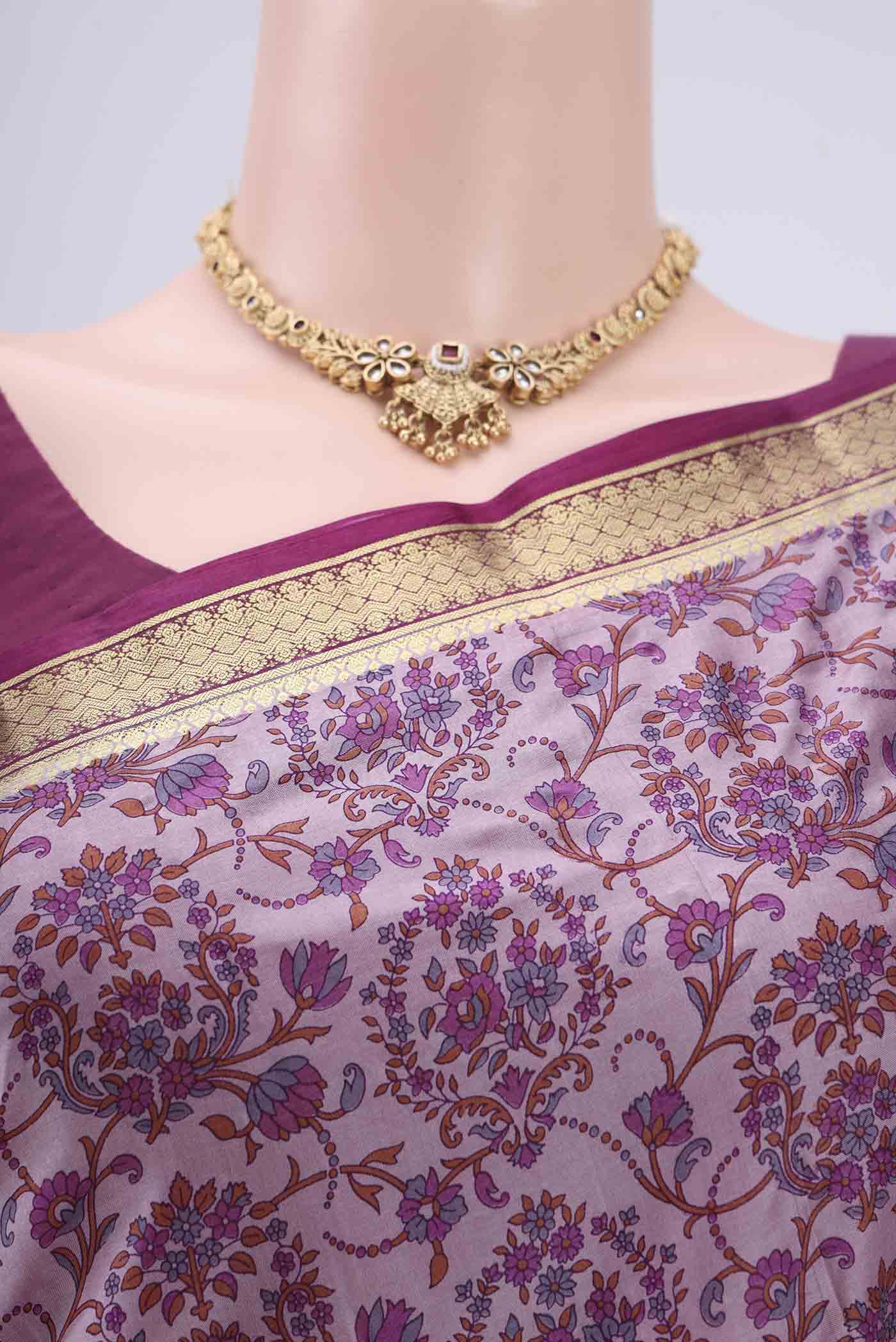 Border image of Purple Printed Silk Saree with Printed design on the body and Zari Border. 