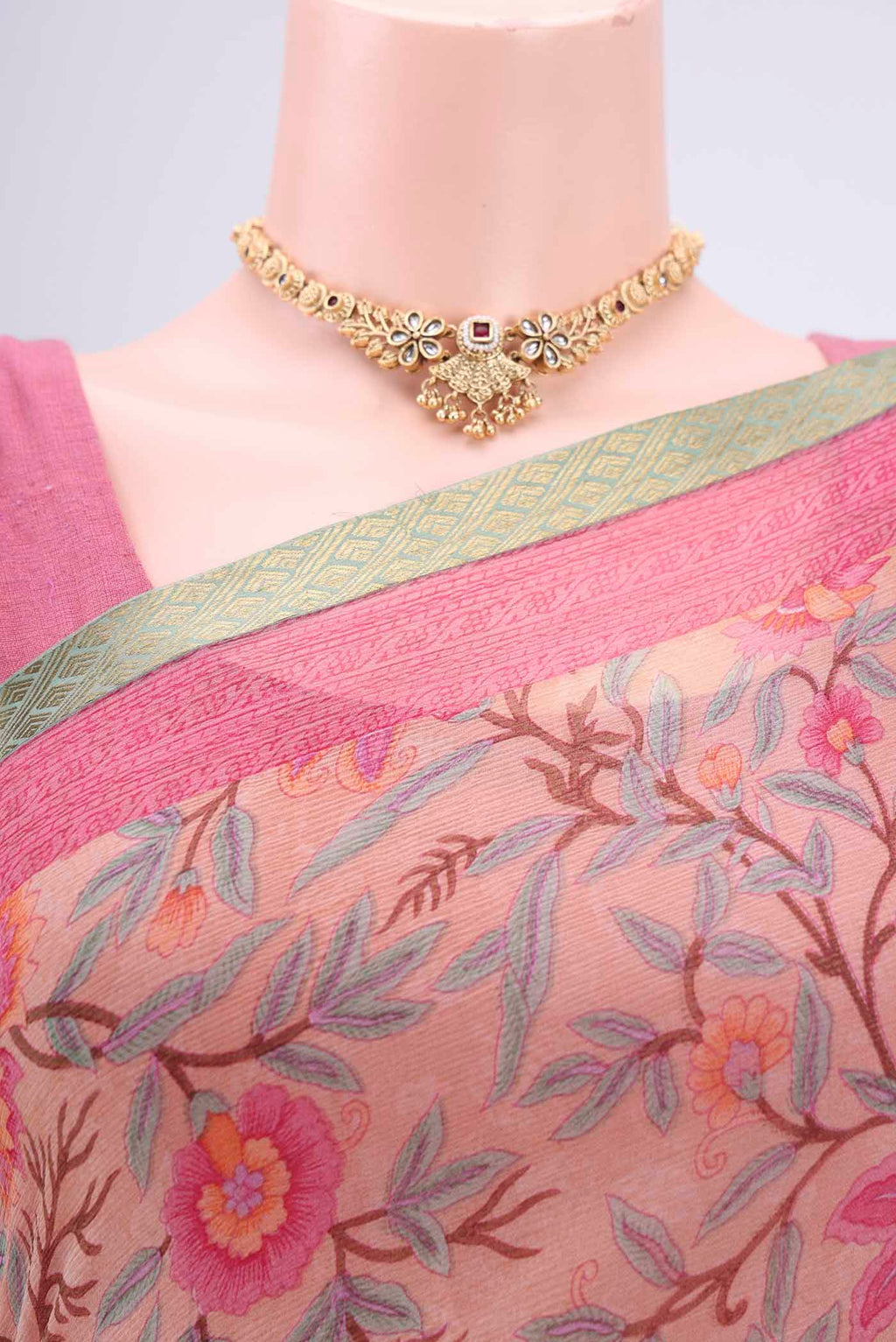 Border image of Peach Mysore Chiffon Saree with Floral Print on the body and Satin Border. 