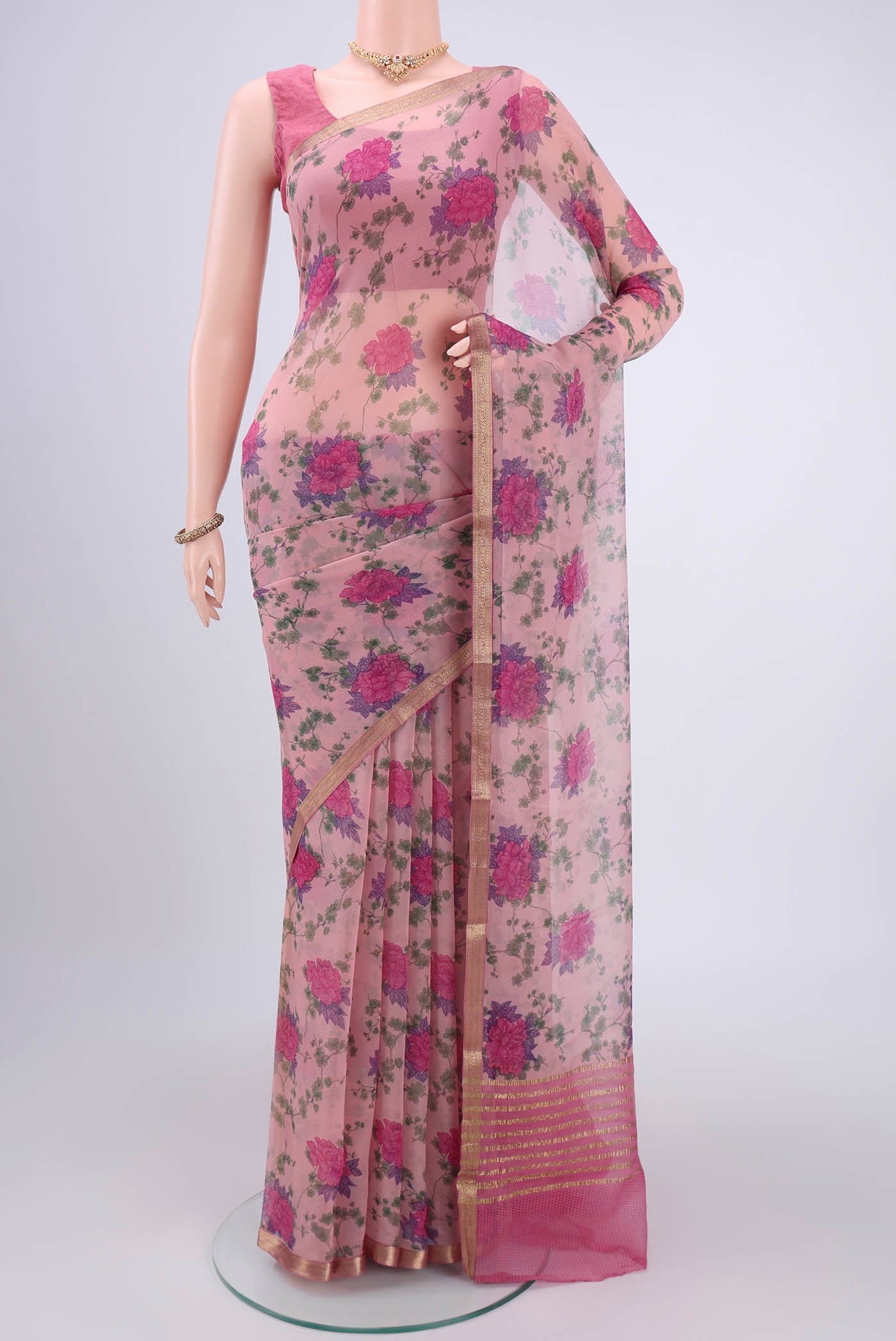 Rose pink Mysore Chiffon Saree with Floral Print on the body and Satin Border.  displayed on a mannequin