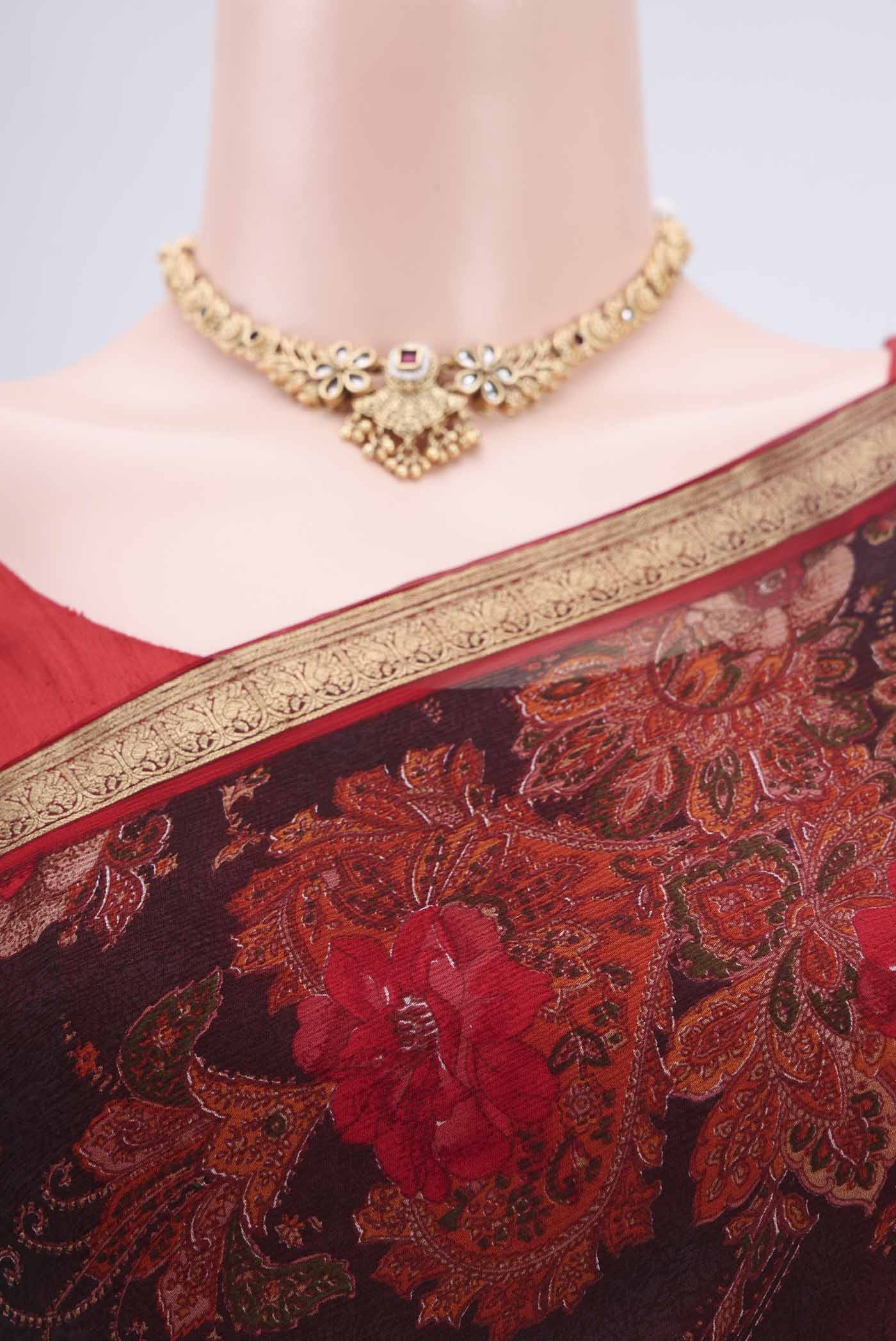 Border image of Black Mysore Chiffon Saree with Floral Print on the body and Zari Border. 